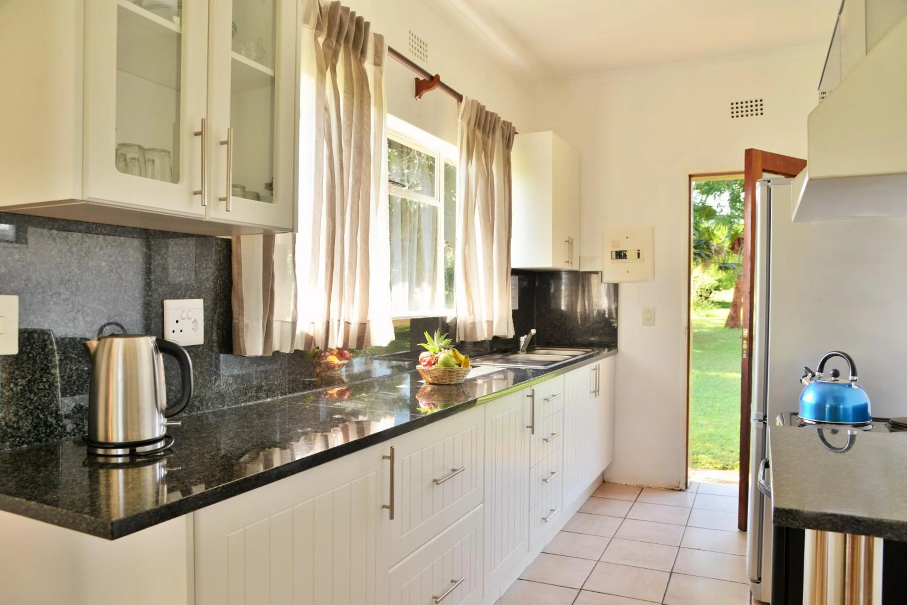Kitchen or kitchenette in Elephant Walk Retreat