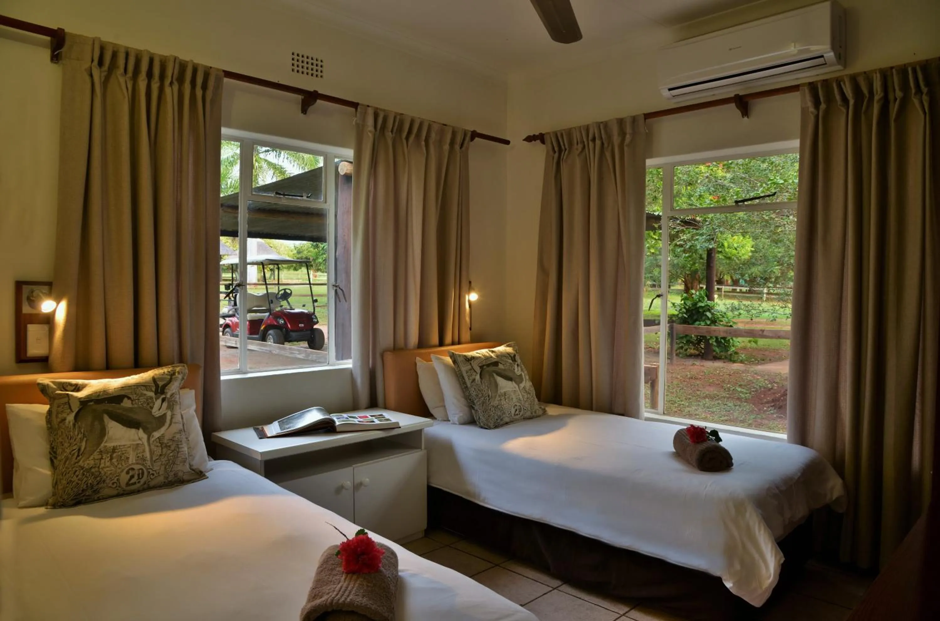 Photo of the whole room, Bed in Elephant Walk Retreat