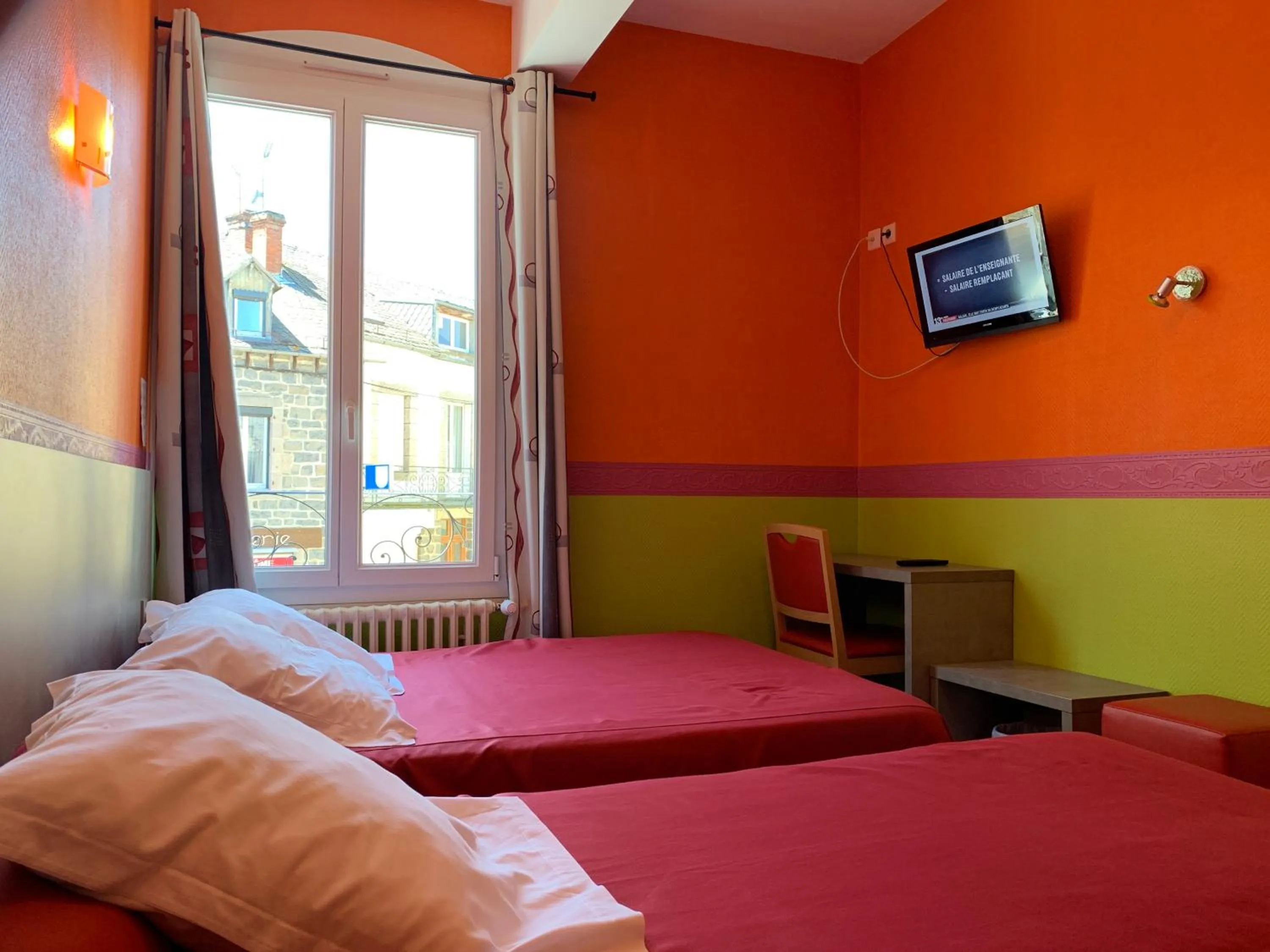 Bed in Hotel des voyageurs Chez Betty