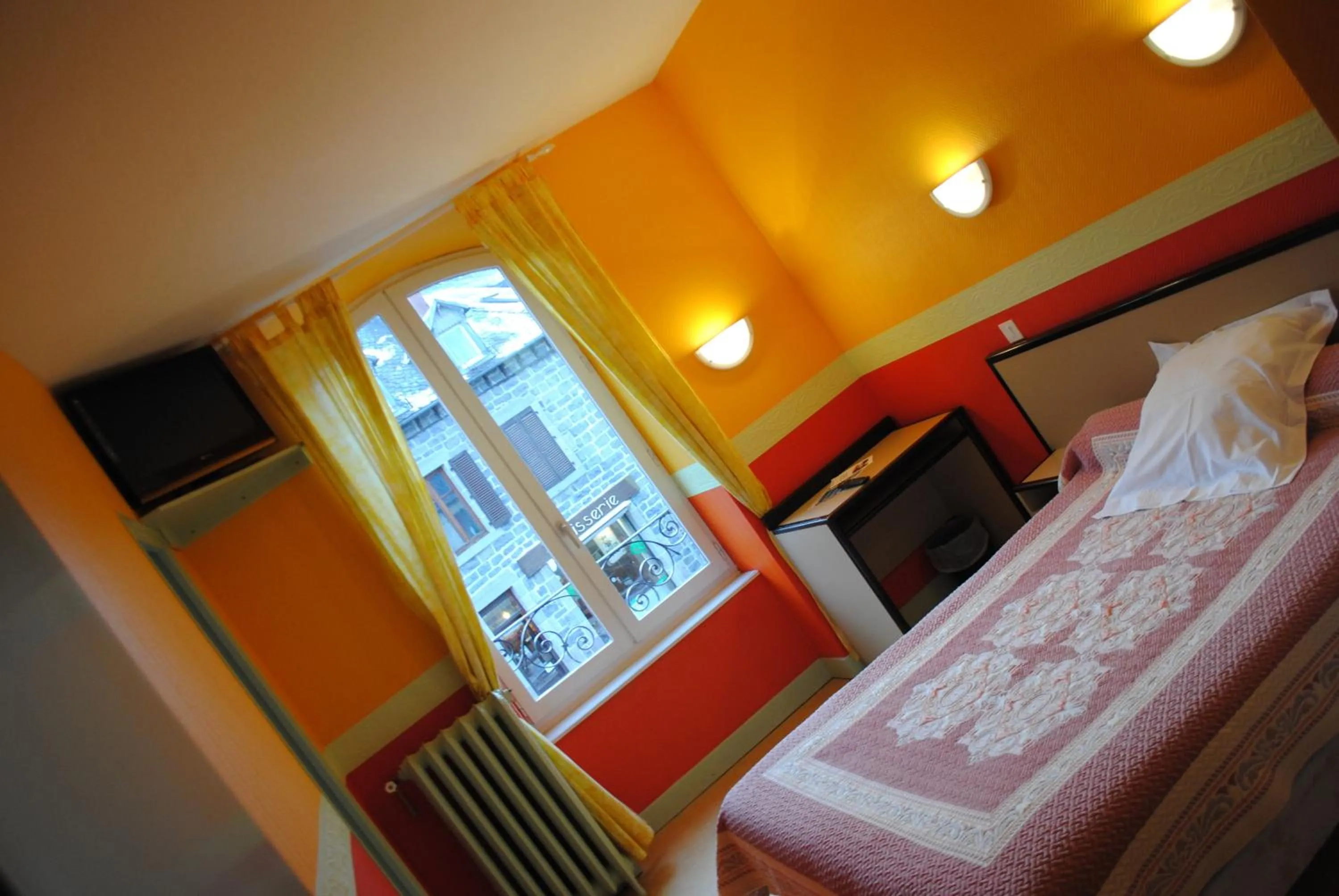 Bed in Hotel des voyageurs Chez Betty