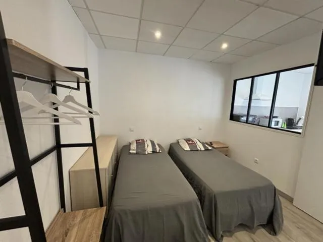 Bed in Hotel des voyageurs Chez Betty