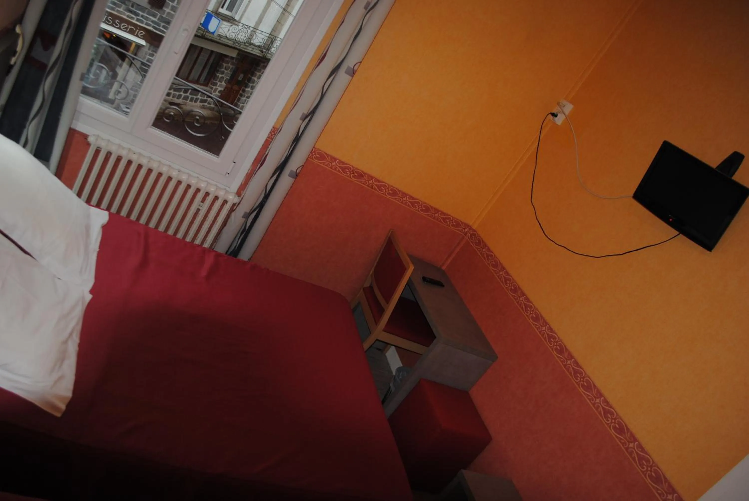 Bed in Hotel des voyageurs Chez Betty