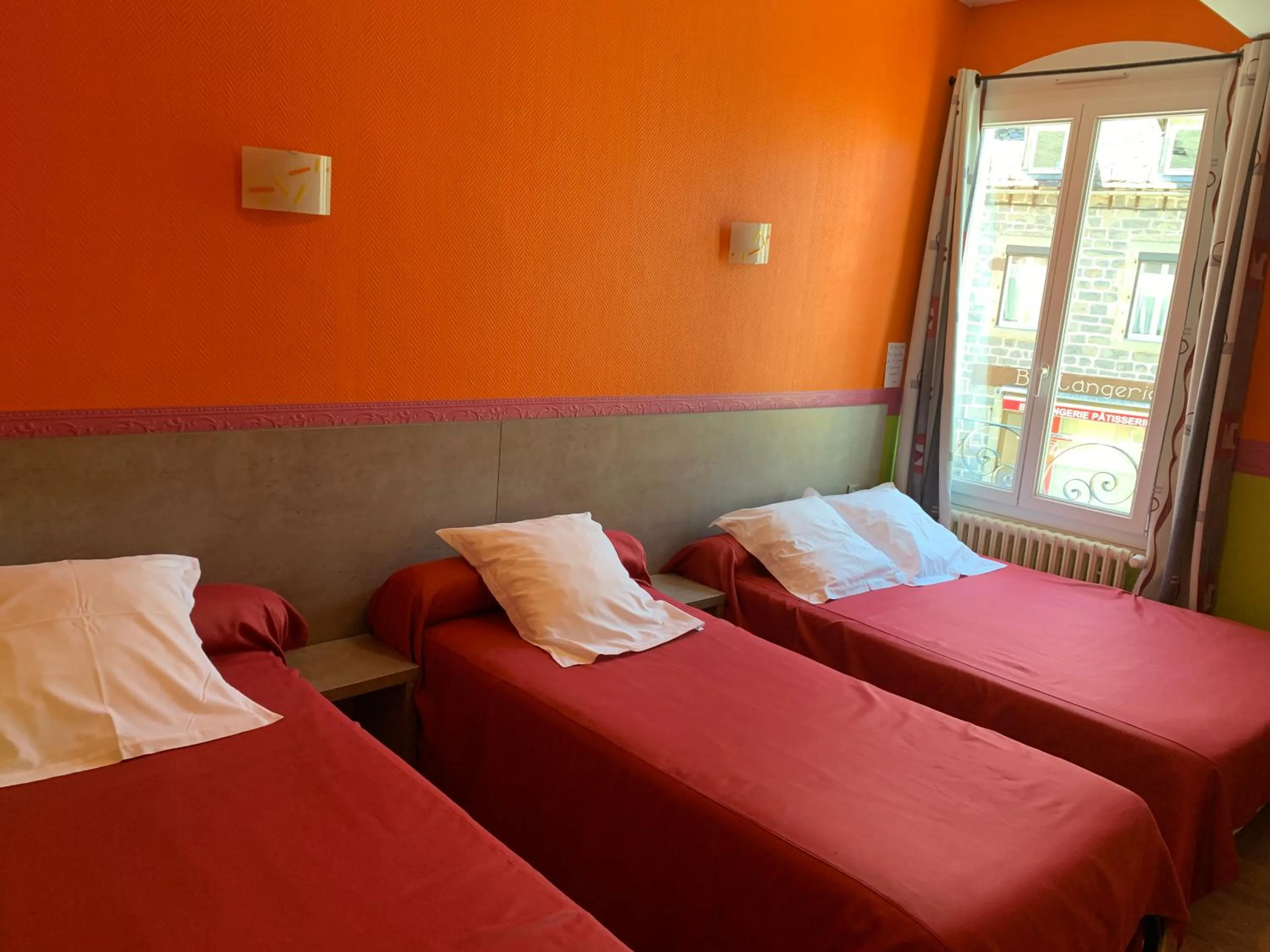 Bed in Hotel des voyageurs Chez Betty