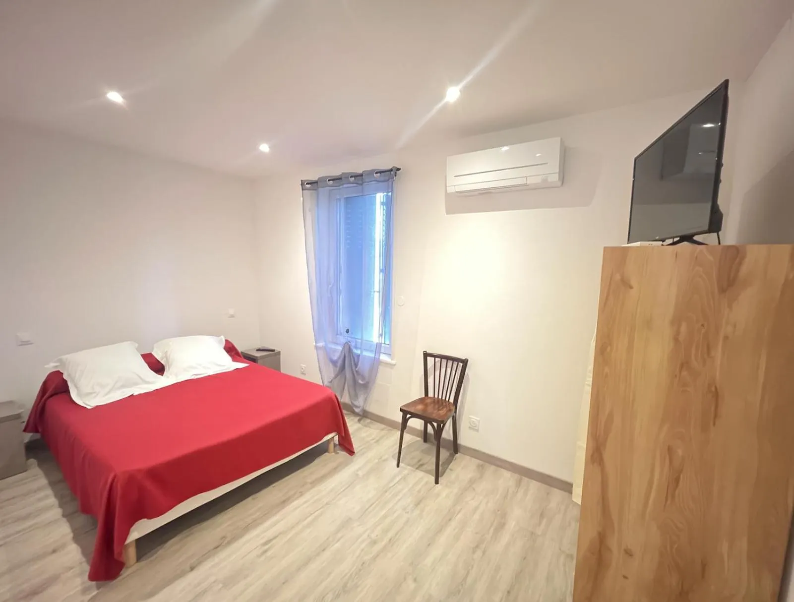 Bed in Hotel des voyageurs Chez Betty