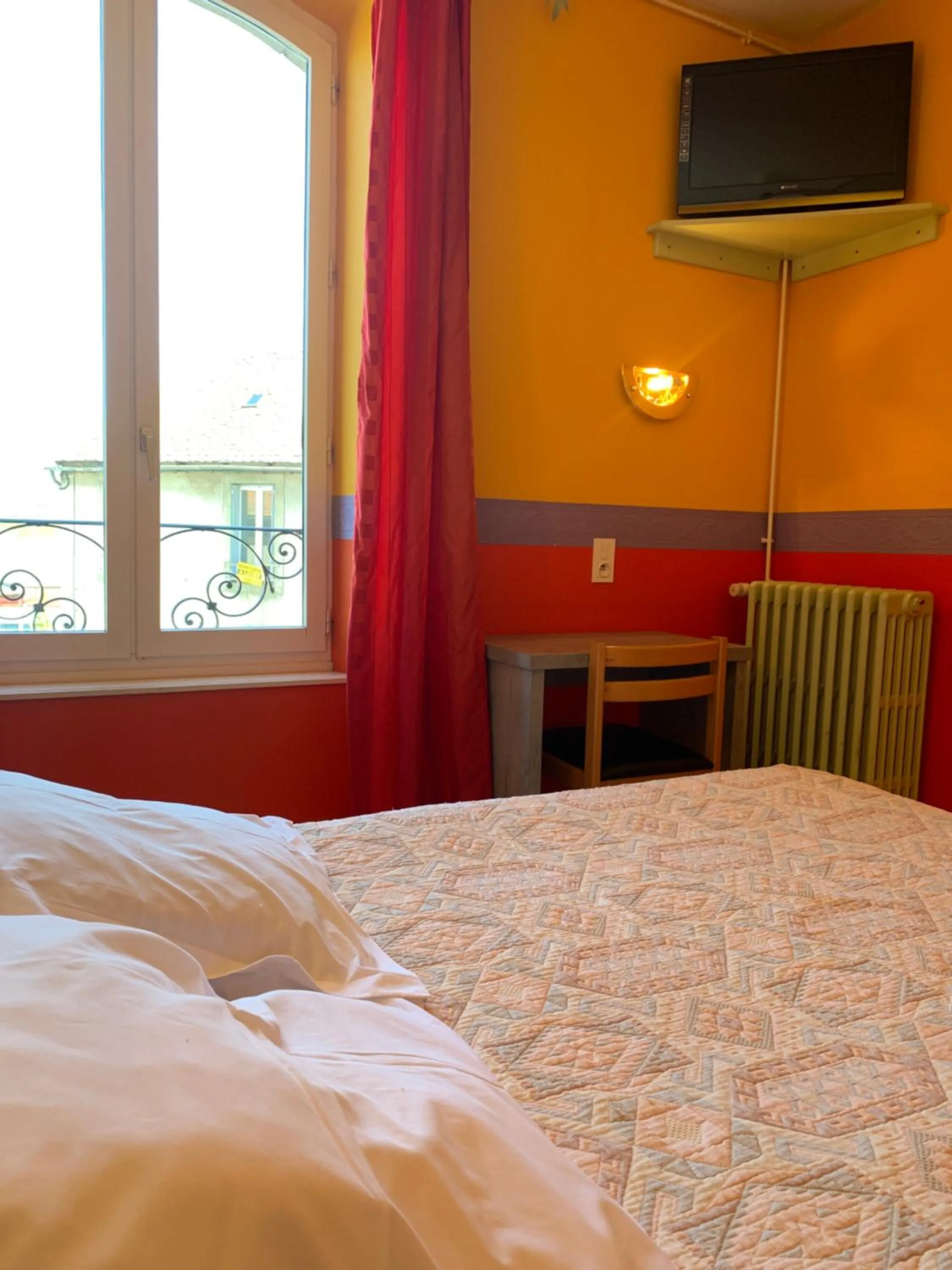 Bed in Hotel des voyageurs Chez Betty