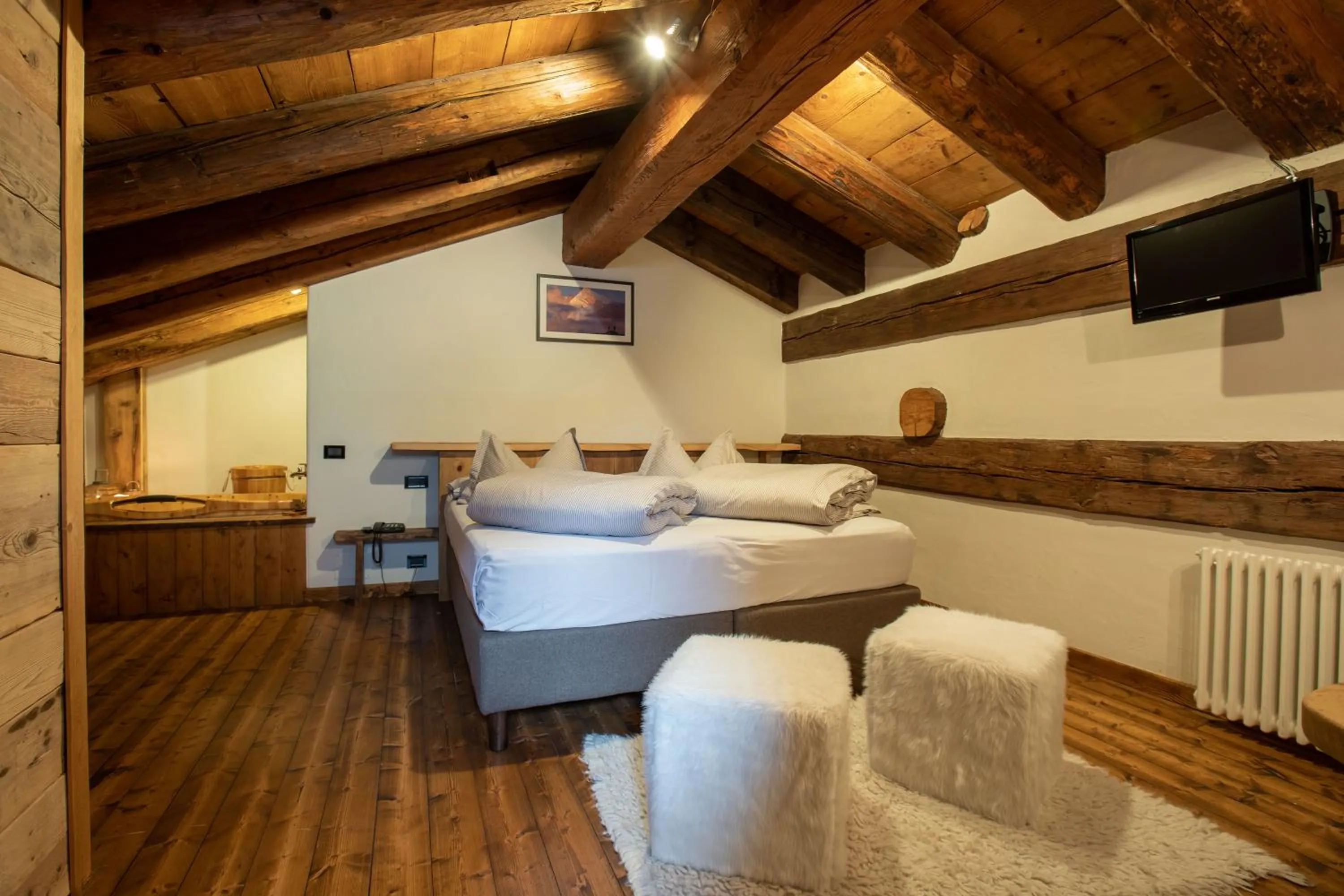 Bed in Chalet Svizzero