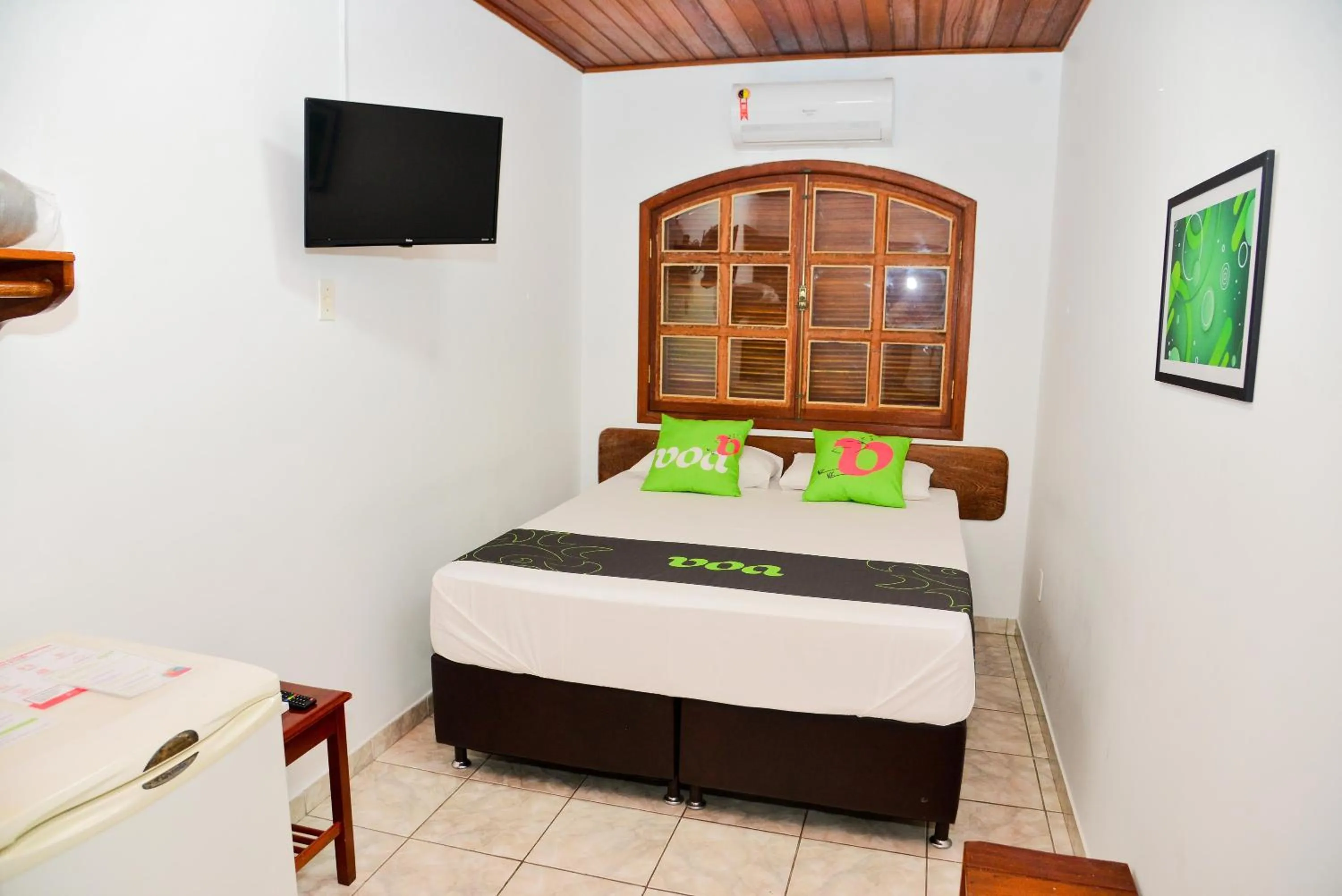 Bed in VOA Pousada Dos Jasmins