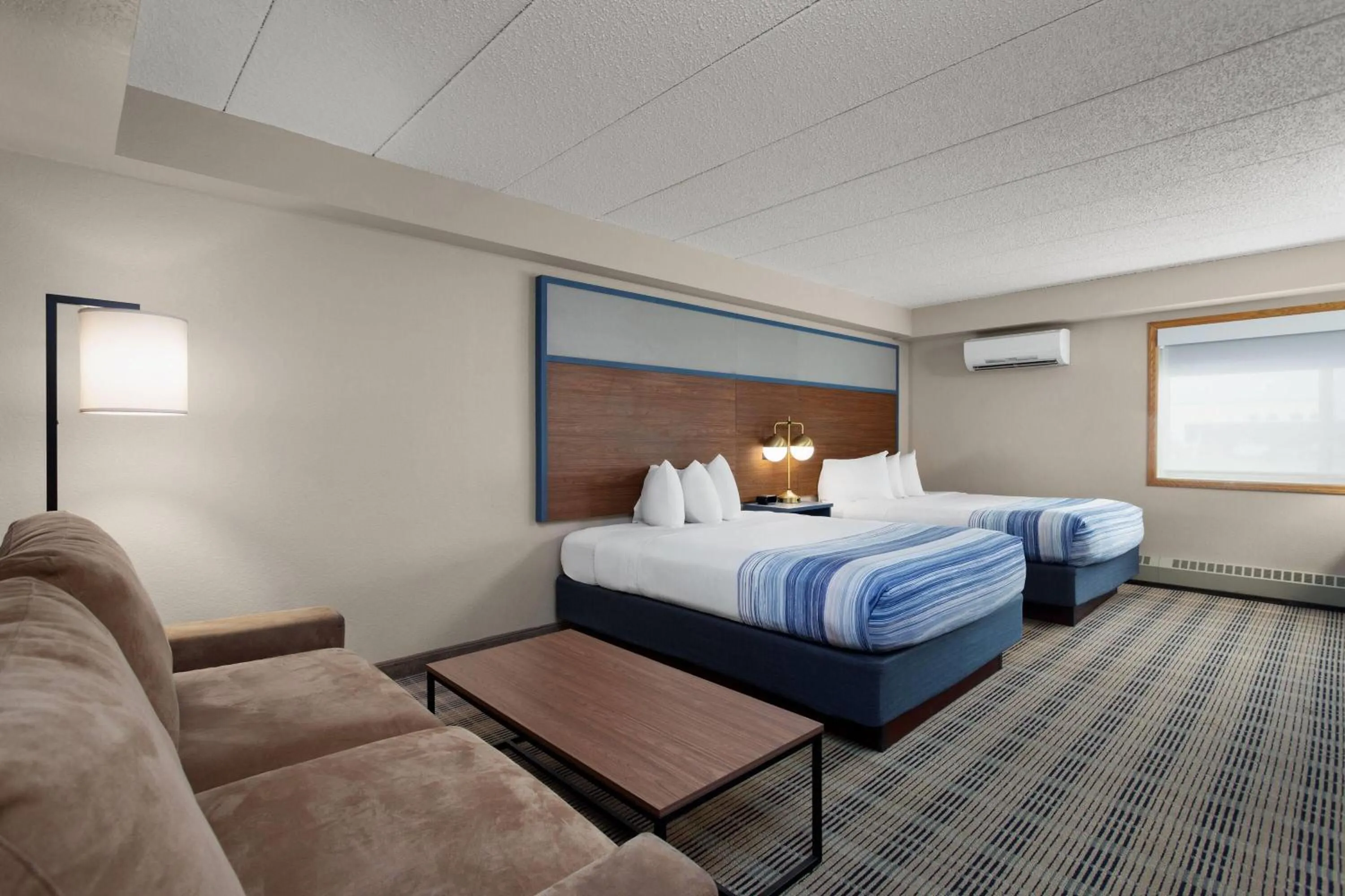Photo of the whole room, Bed in AmericInn by Wyndham Roseau