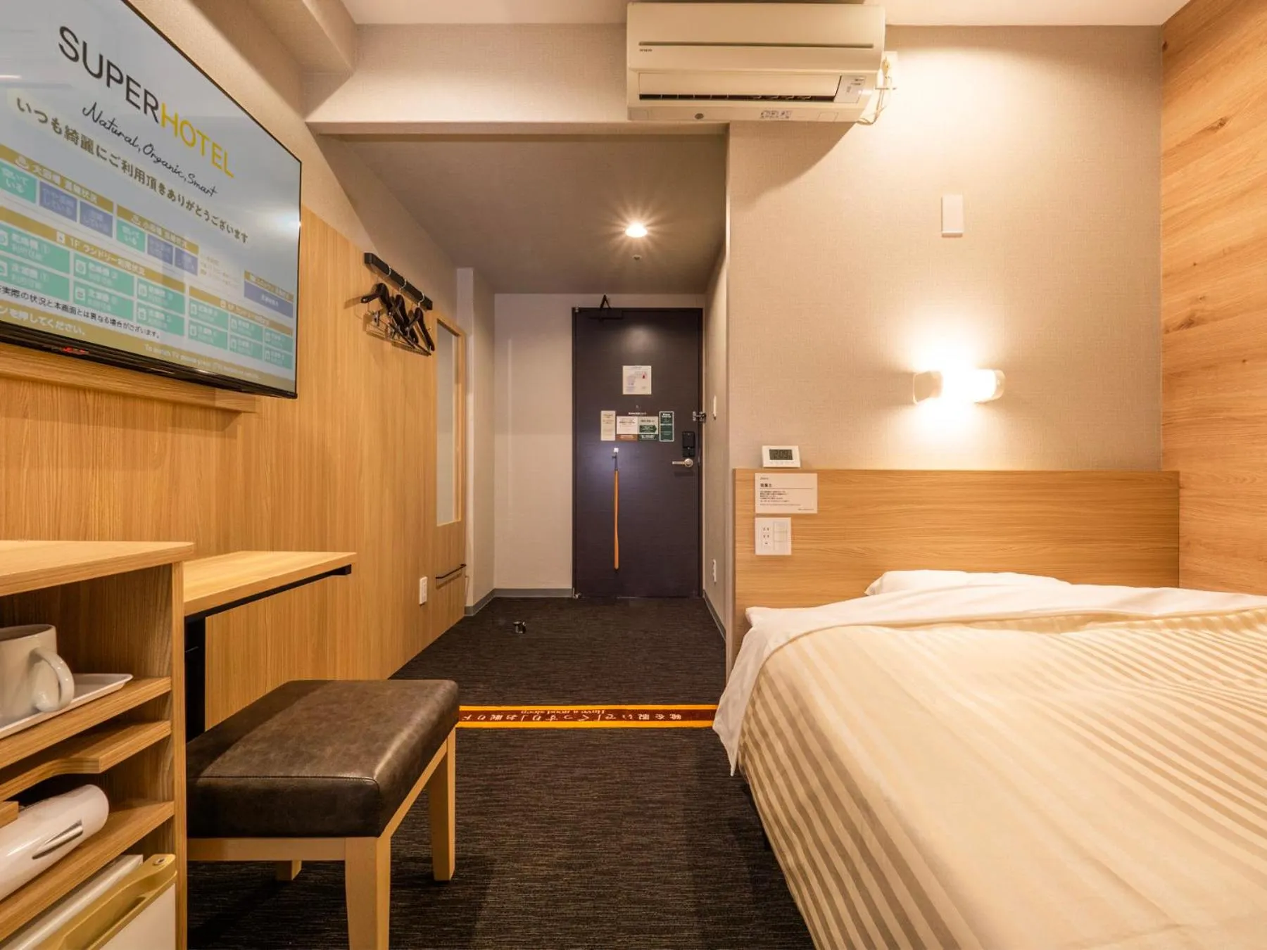 Bed in Super Hotel Osaka Natural Hot Springs