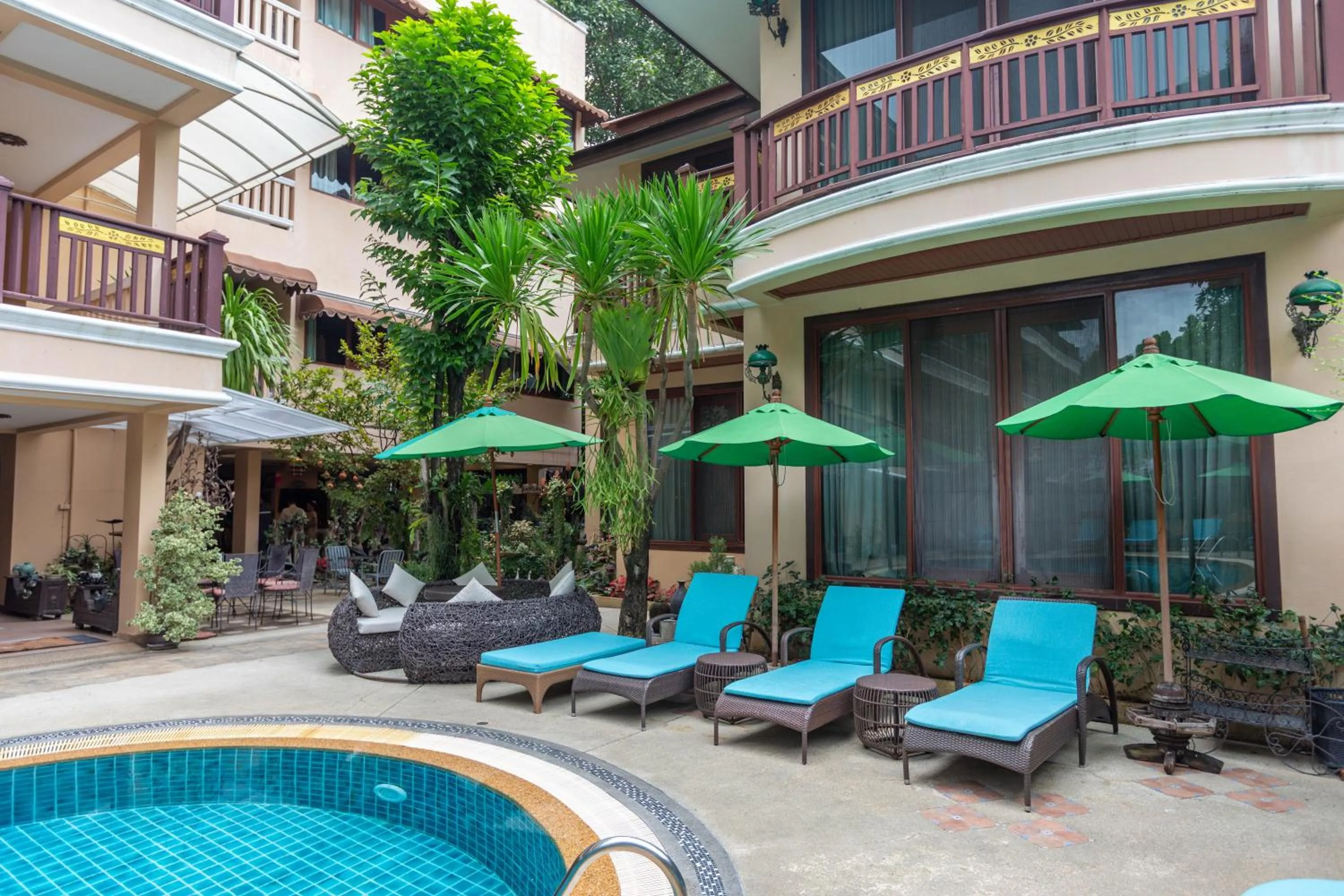 Swimming pool in At Chiang Mai Hotel