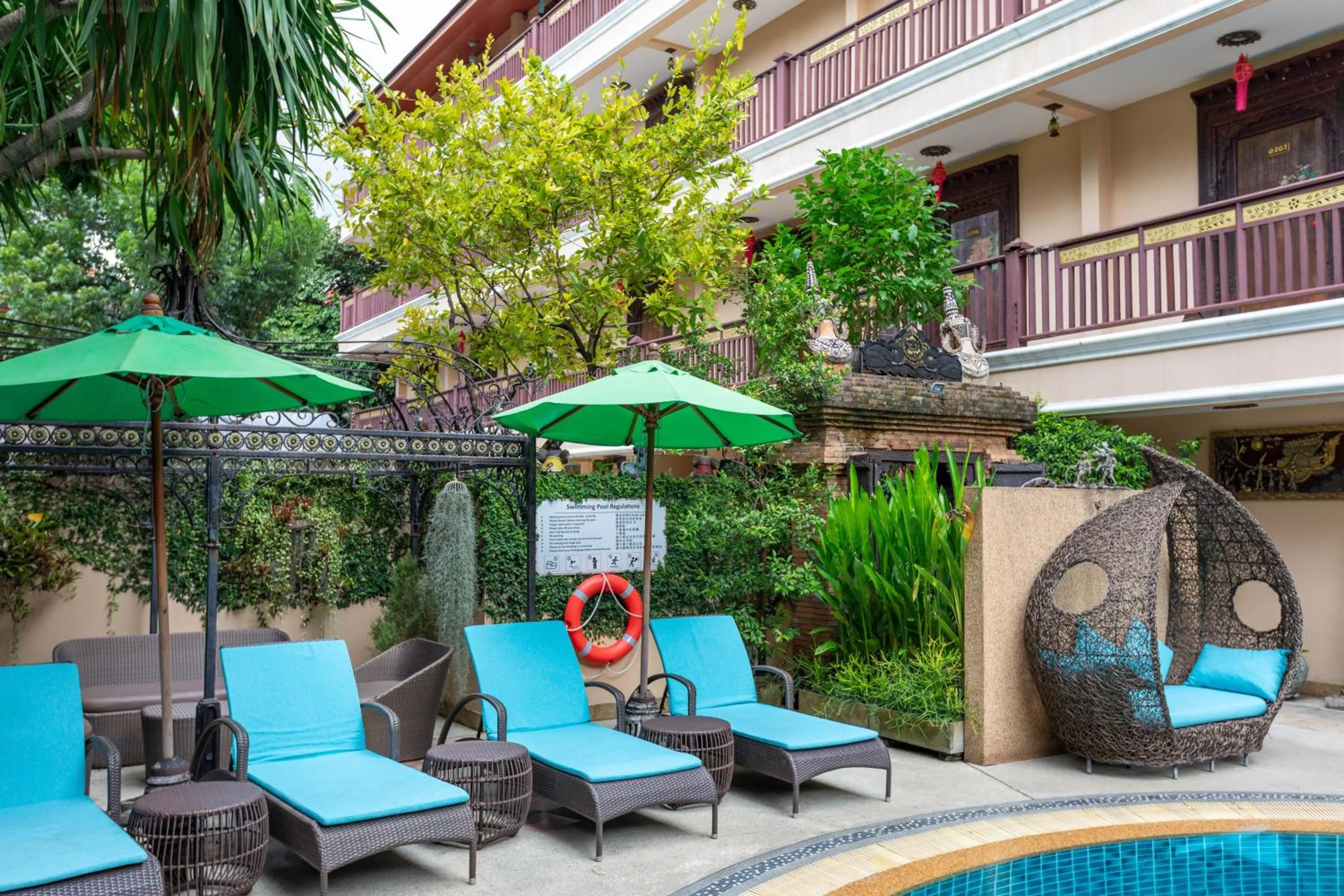 Swimming pool in At Chiang Mai Hotel