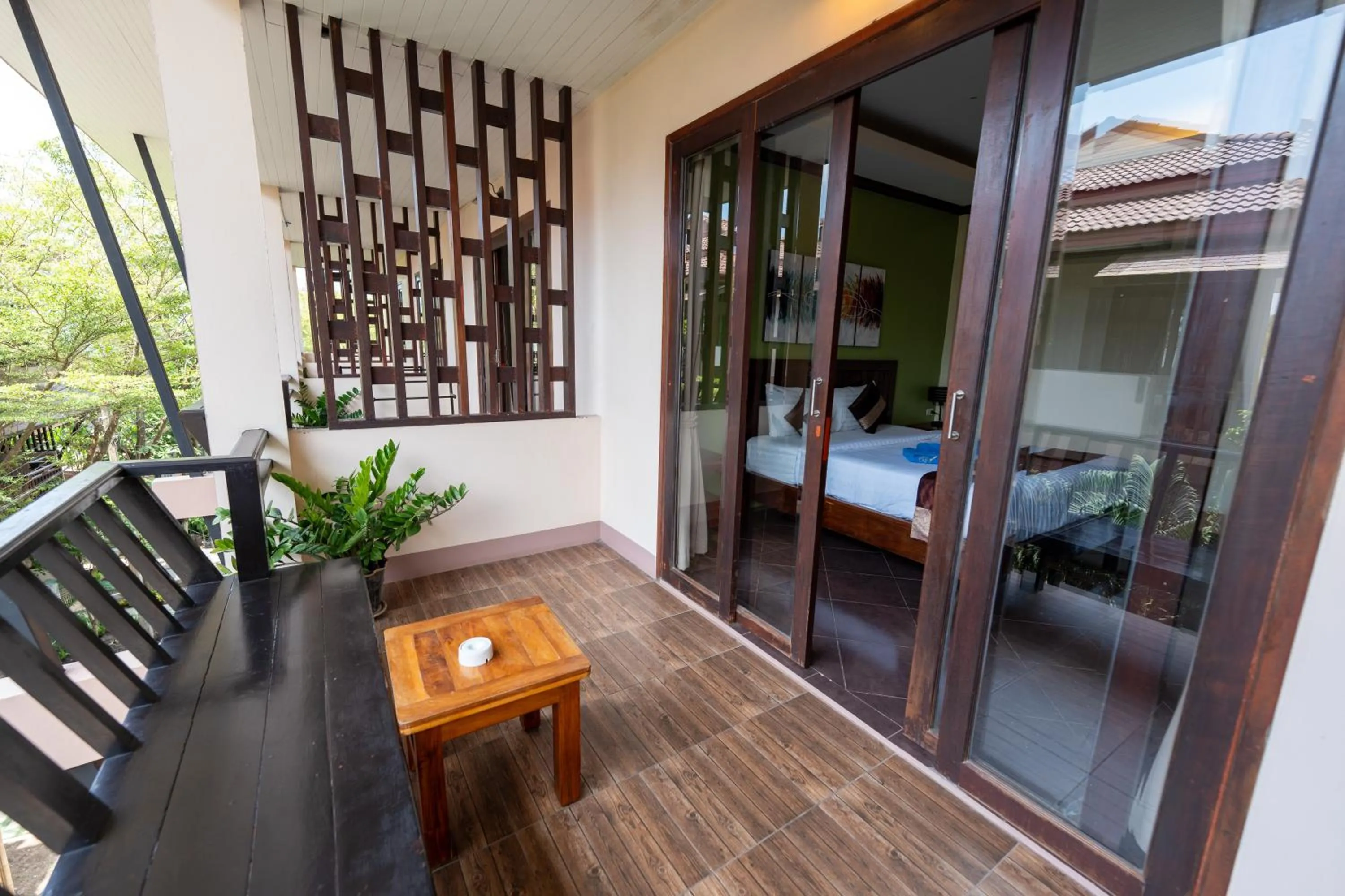 Balcony/Terrace, Bed in Wind Beach Resort