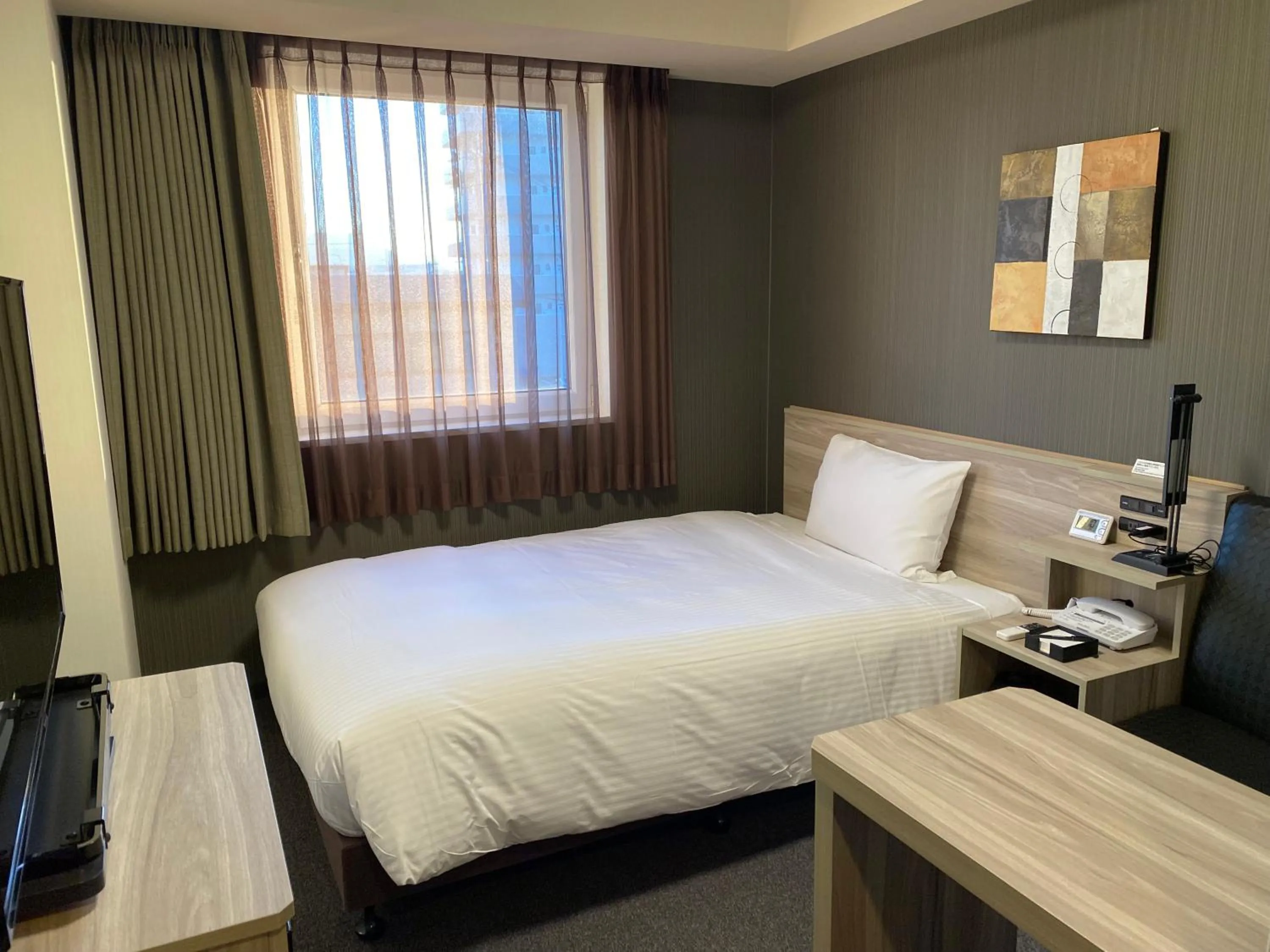 Photo of the whole room, Bed in Hotel Route-Inn Yamagata Minami -Daigaku Byoin Mae-