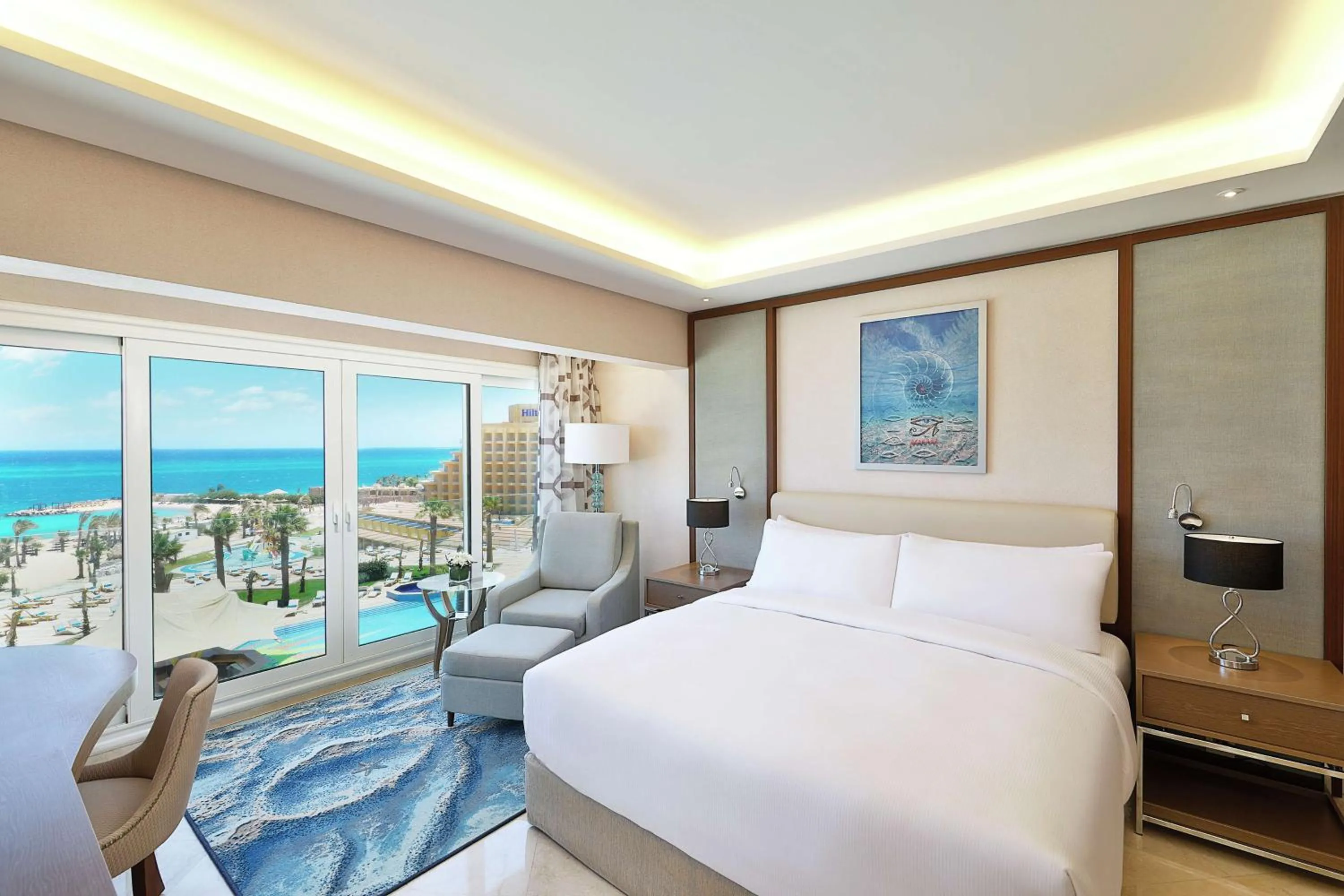 Seating area, Bed in Hilton Hurghada Plaza Hotel