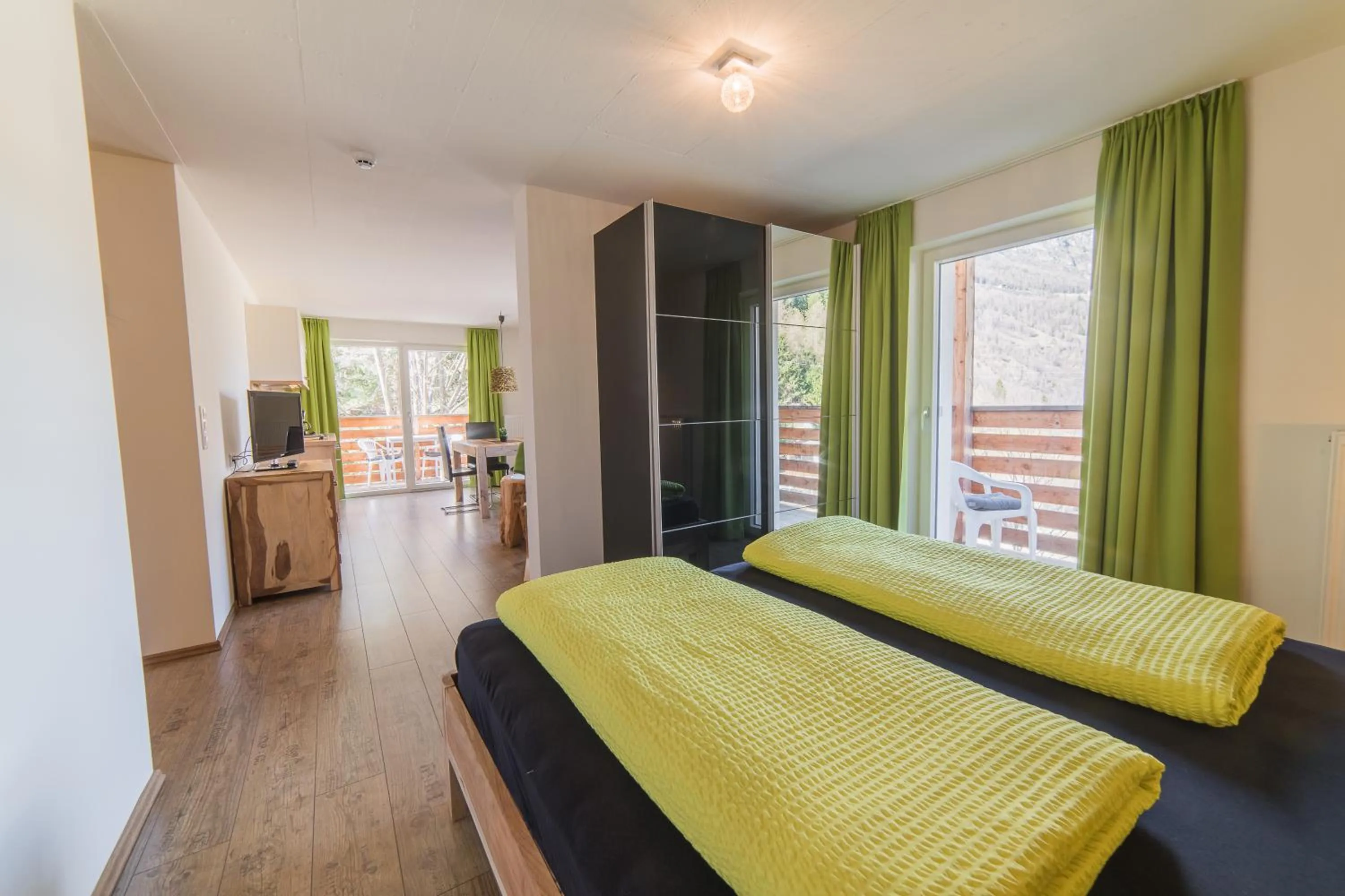 Photo of the whole room, Bed in Residence Martell Mountains