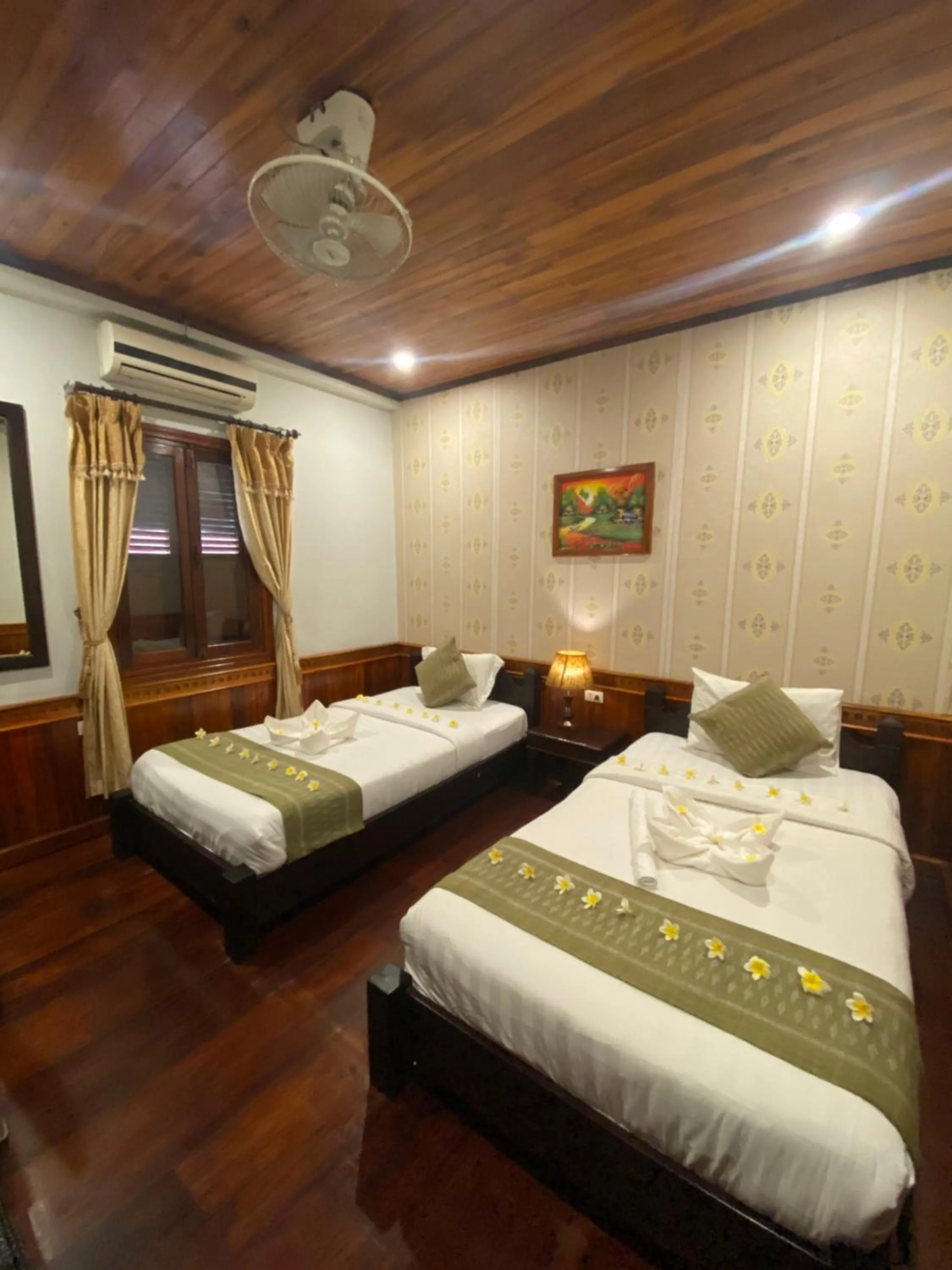 Photo of the whole room, Bed in Golden Lotus Place