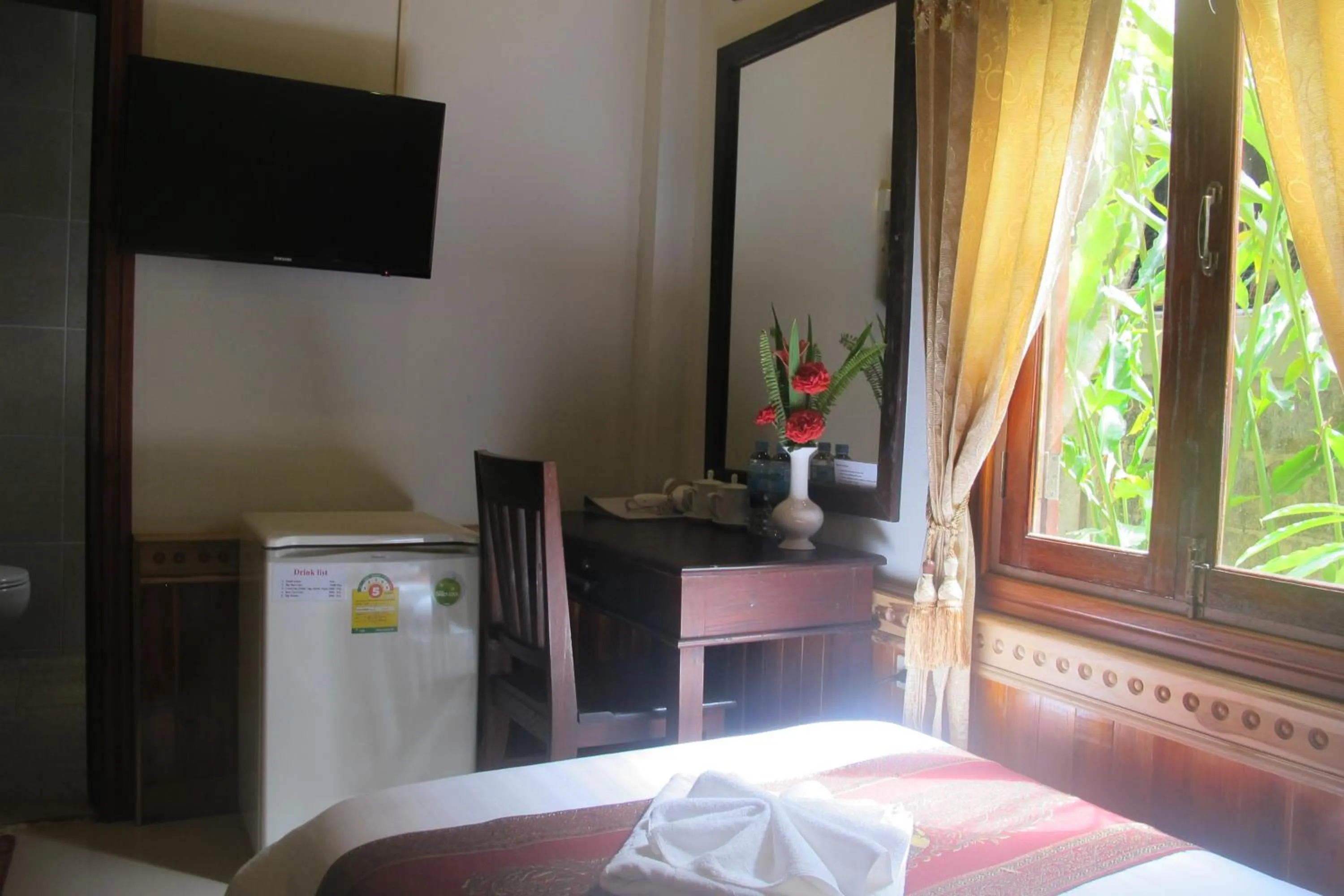 Photo of the whole room, Bed in Golden Lotus Place