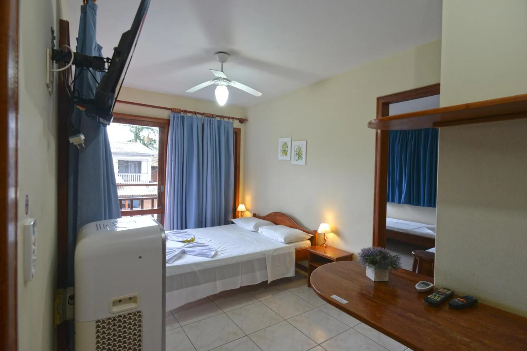 TV and multimedia, Bed in Oceano Pousada - Buffet de café da manhã e serviço de quarto diário