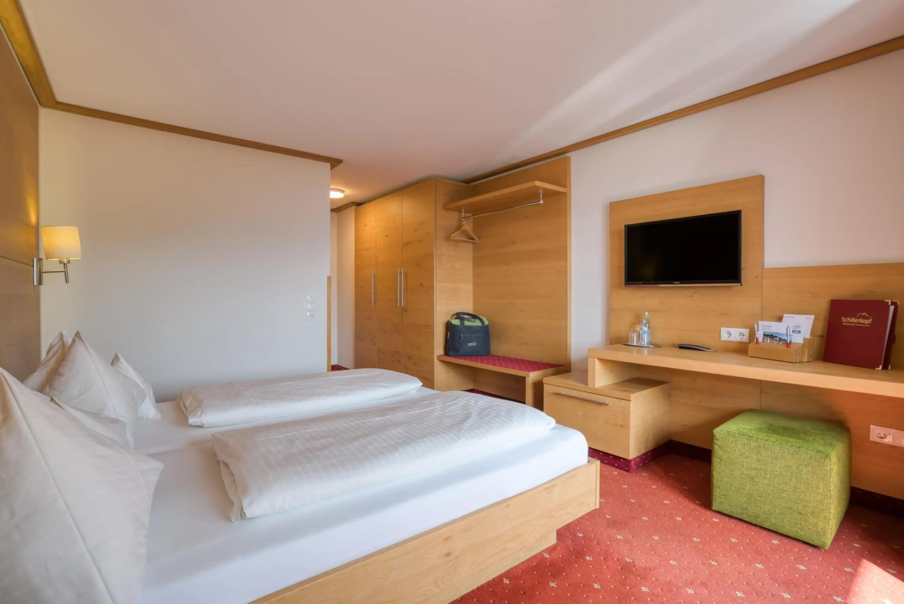 Photo of the whole room, Bed in Alpinresort Schillerkopf