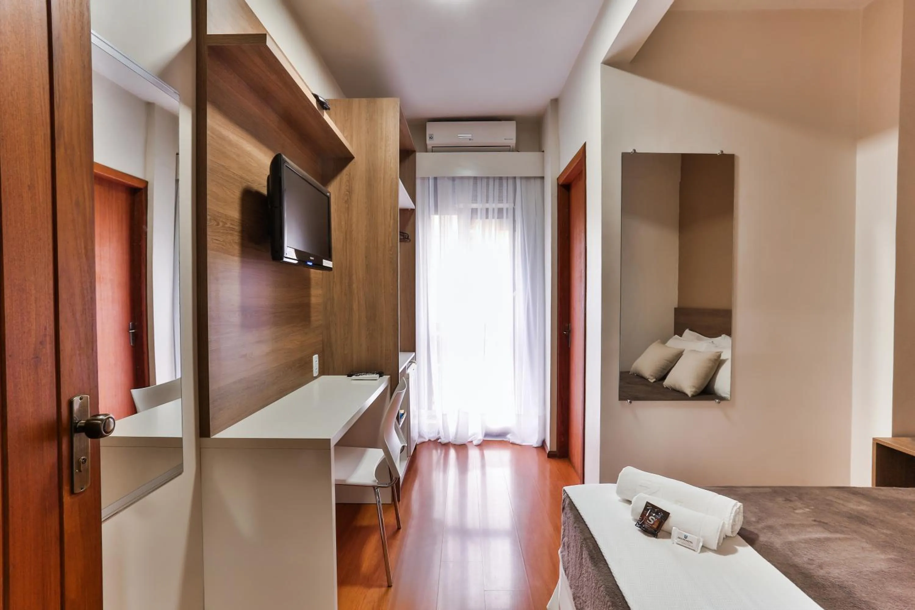 Bed in Zallon Hotel Executivo