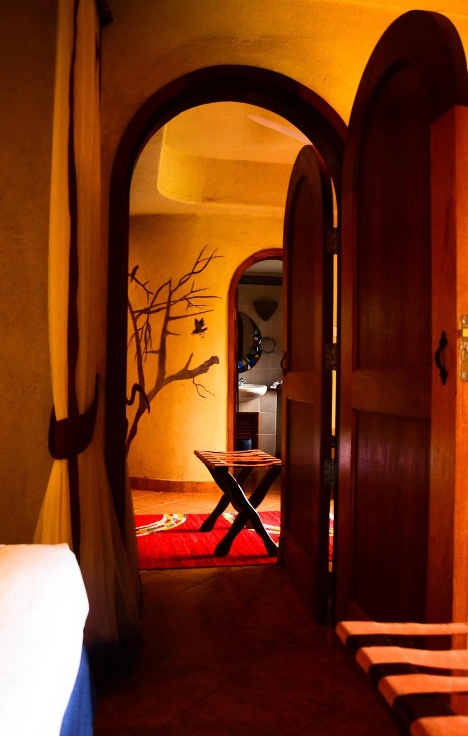 Bathroom, Bed in Amboseli Serena Safari Lodge