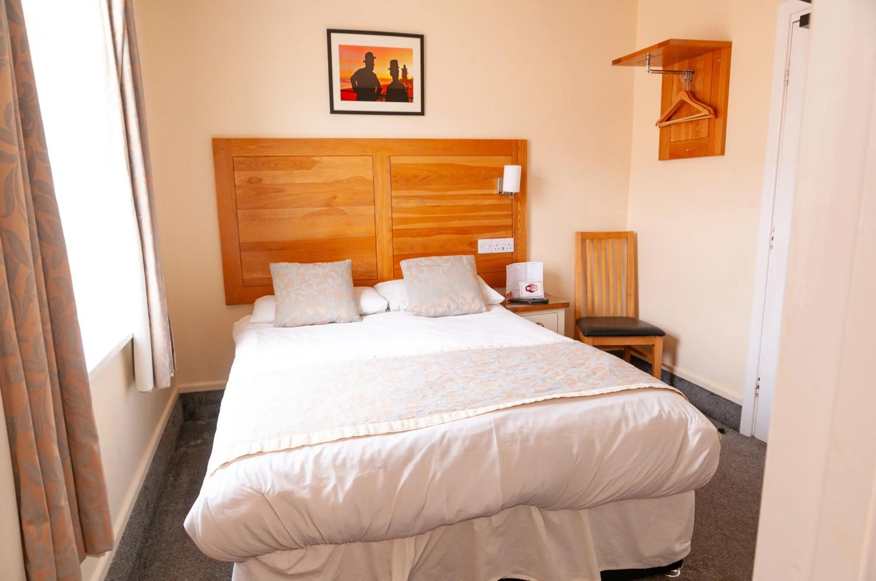 Bed in Claxton Hotel