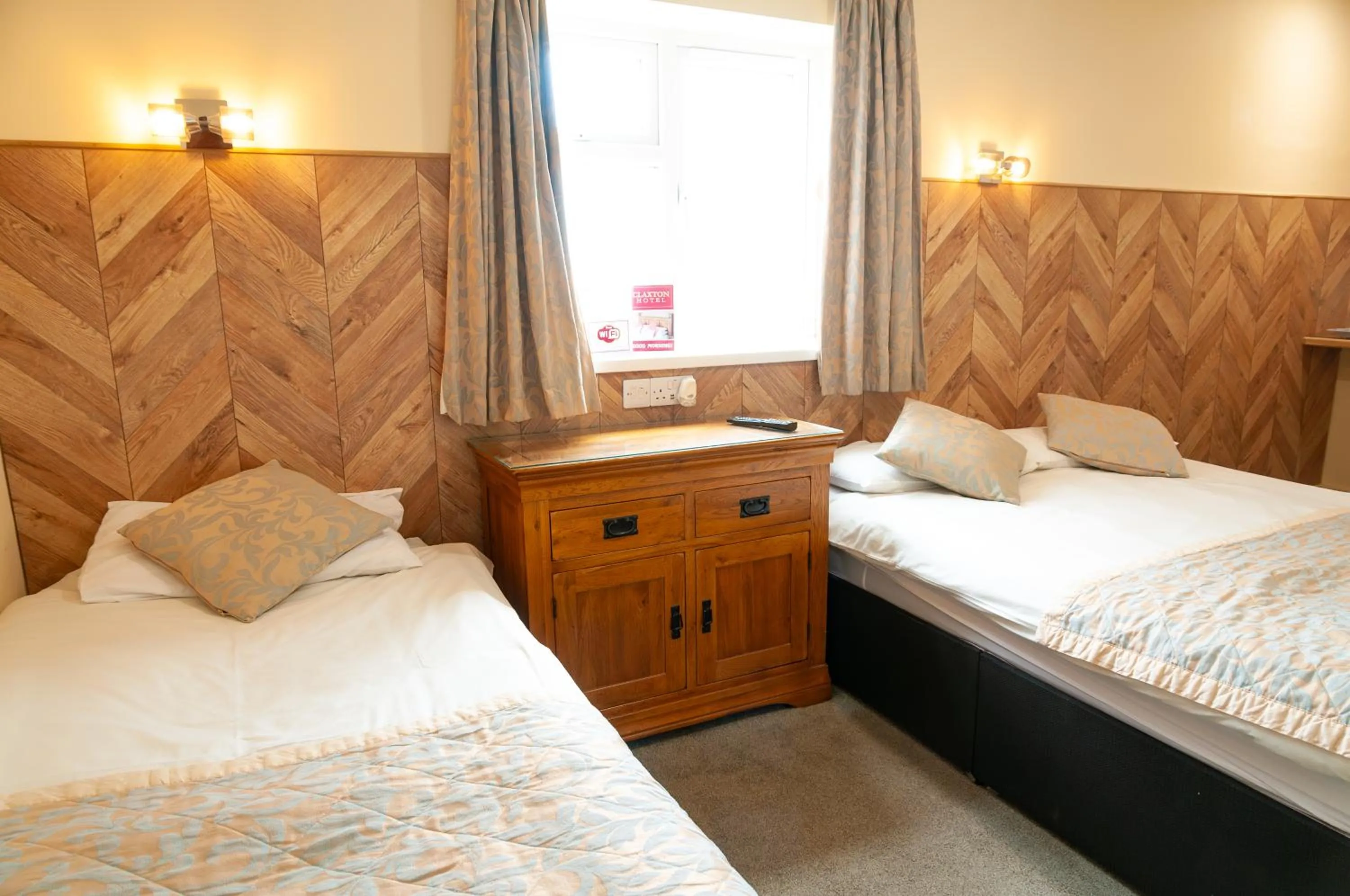 Bed in Claxton Hotel