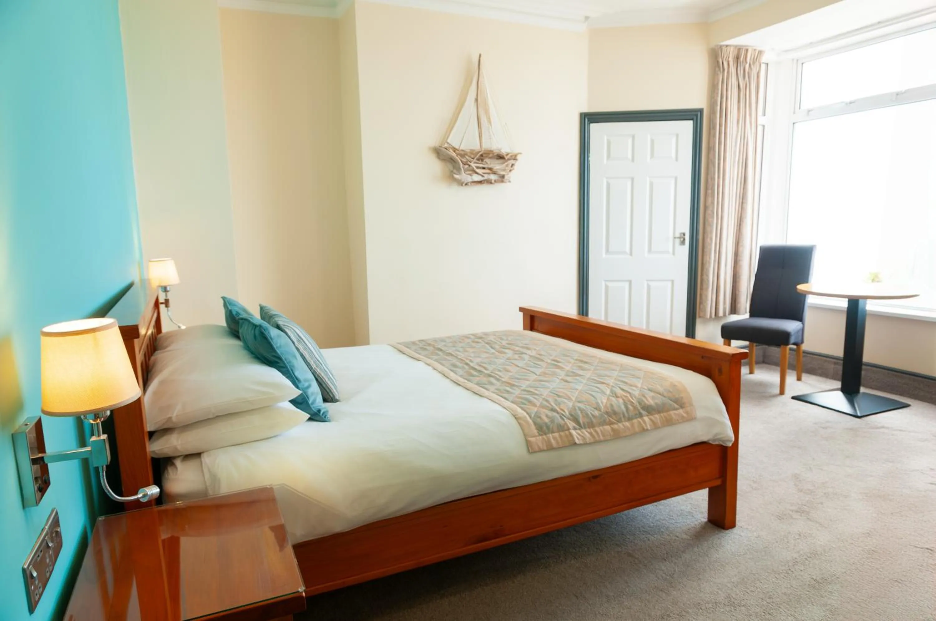 Bed in Claxton Hotel