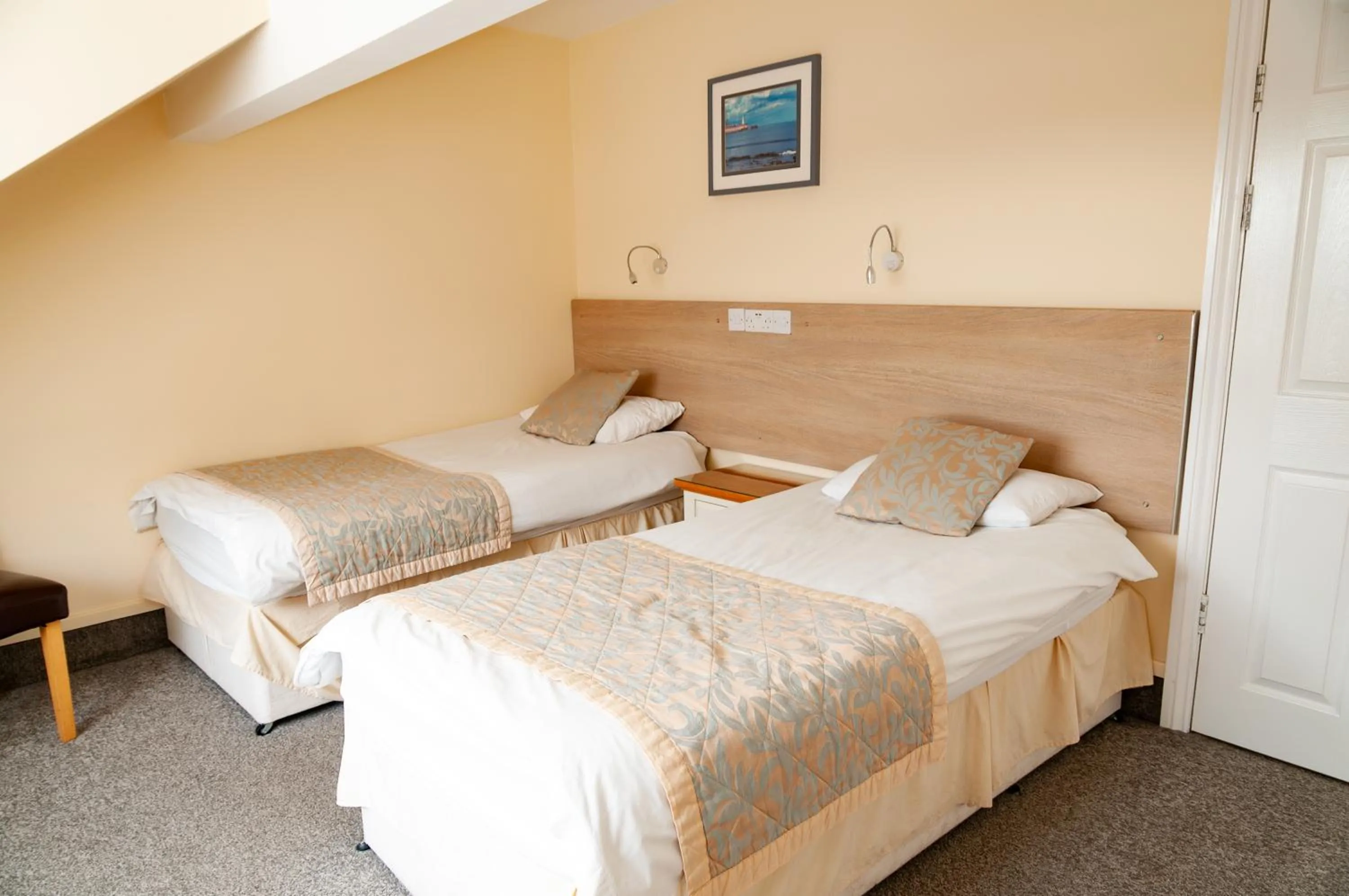 Bed in Claxton Hotel