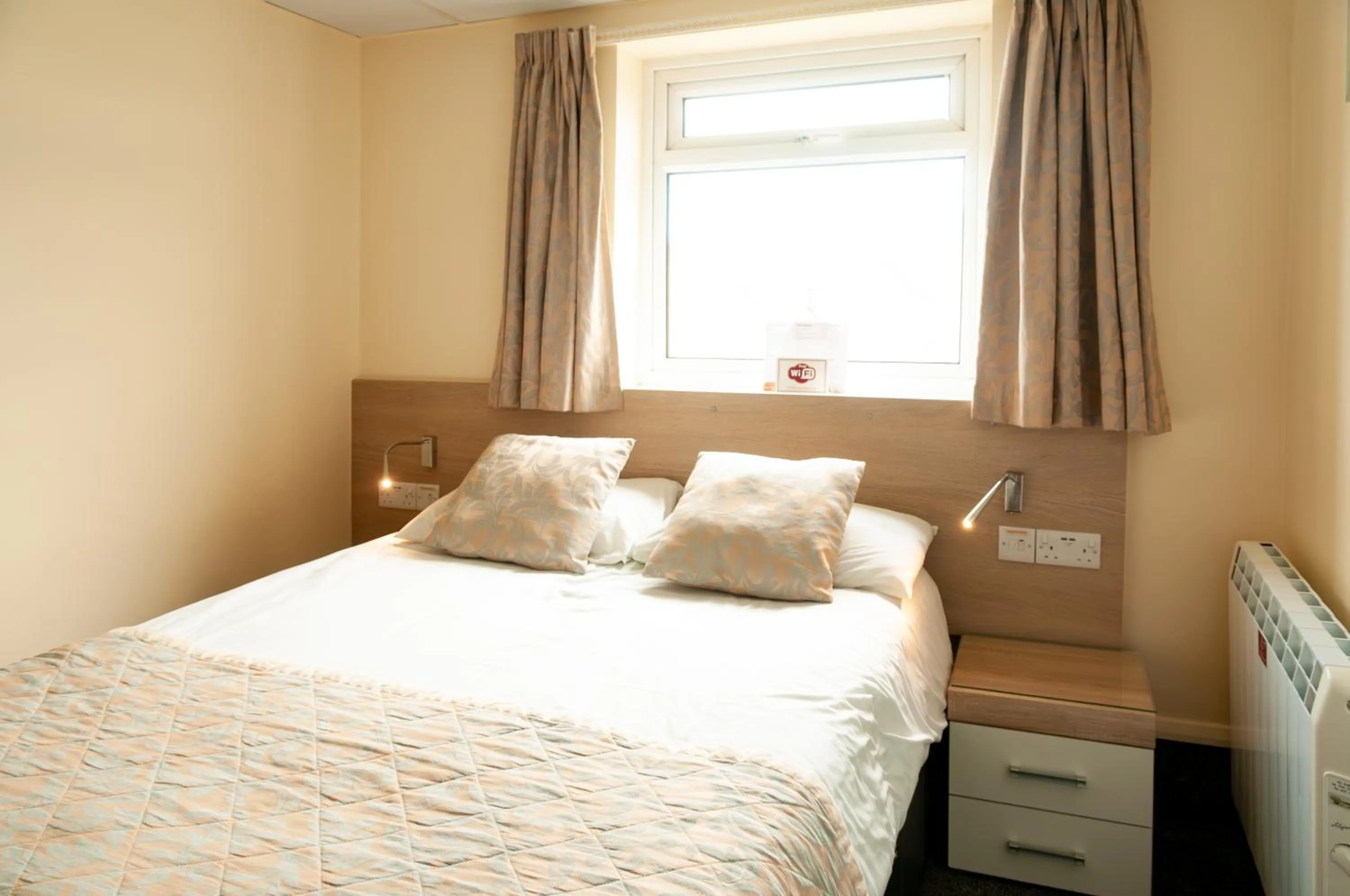 Bed in Claxton Hotel