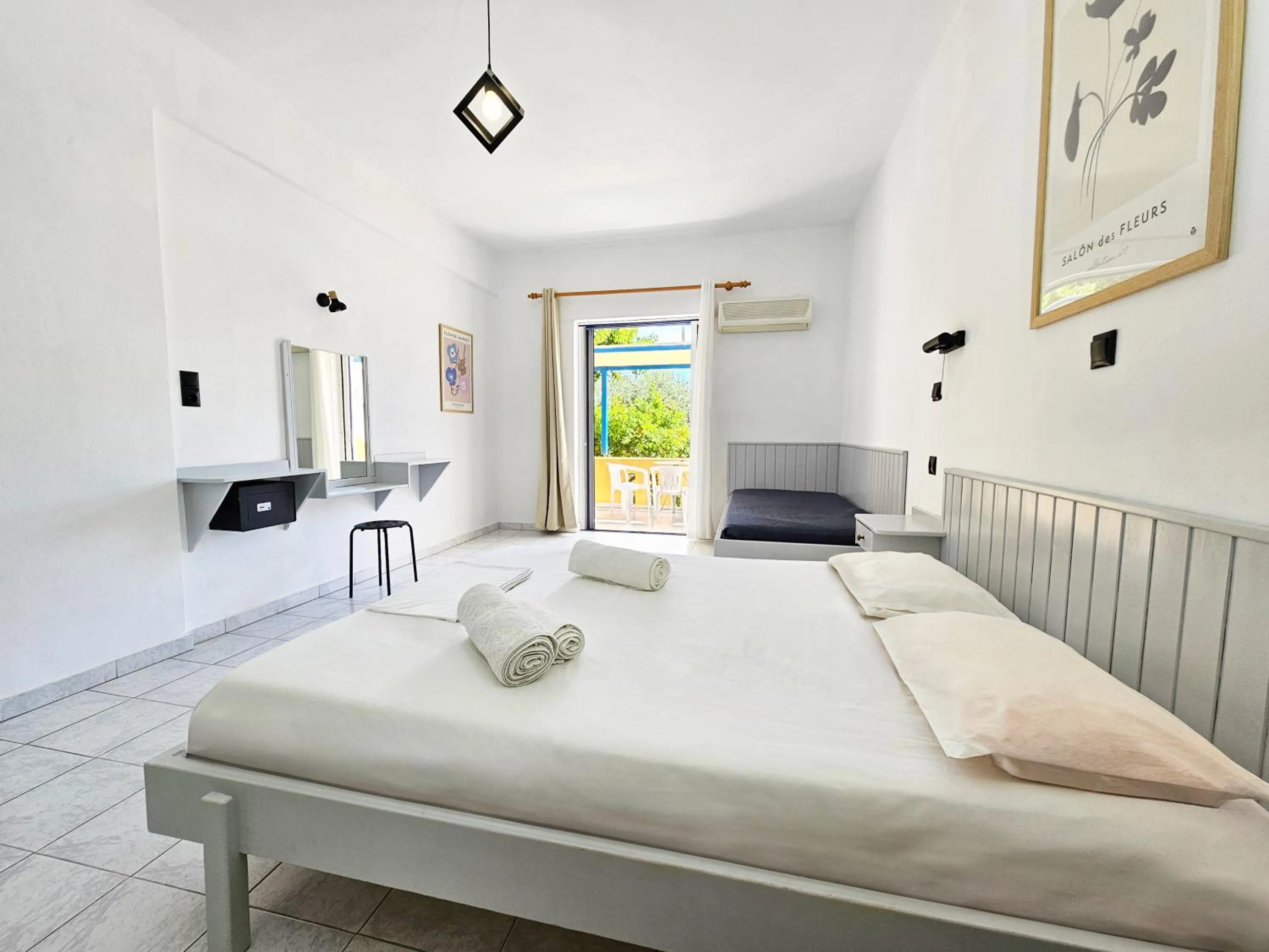 Bed in Pavlis Studios Kampos