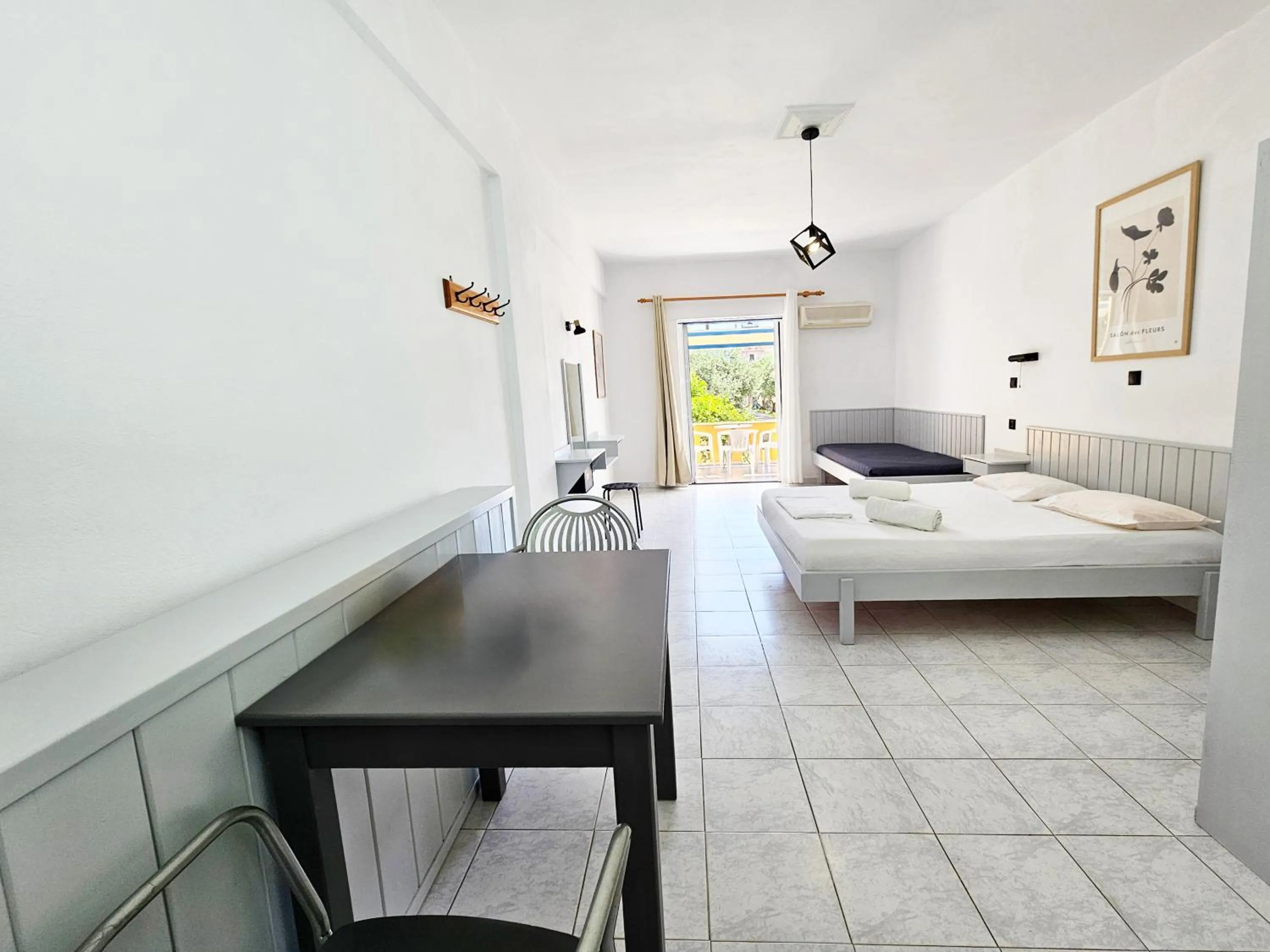 Bed in Pavlis Studios Kampos