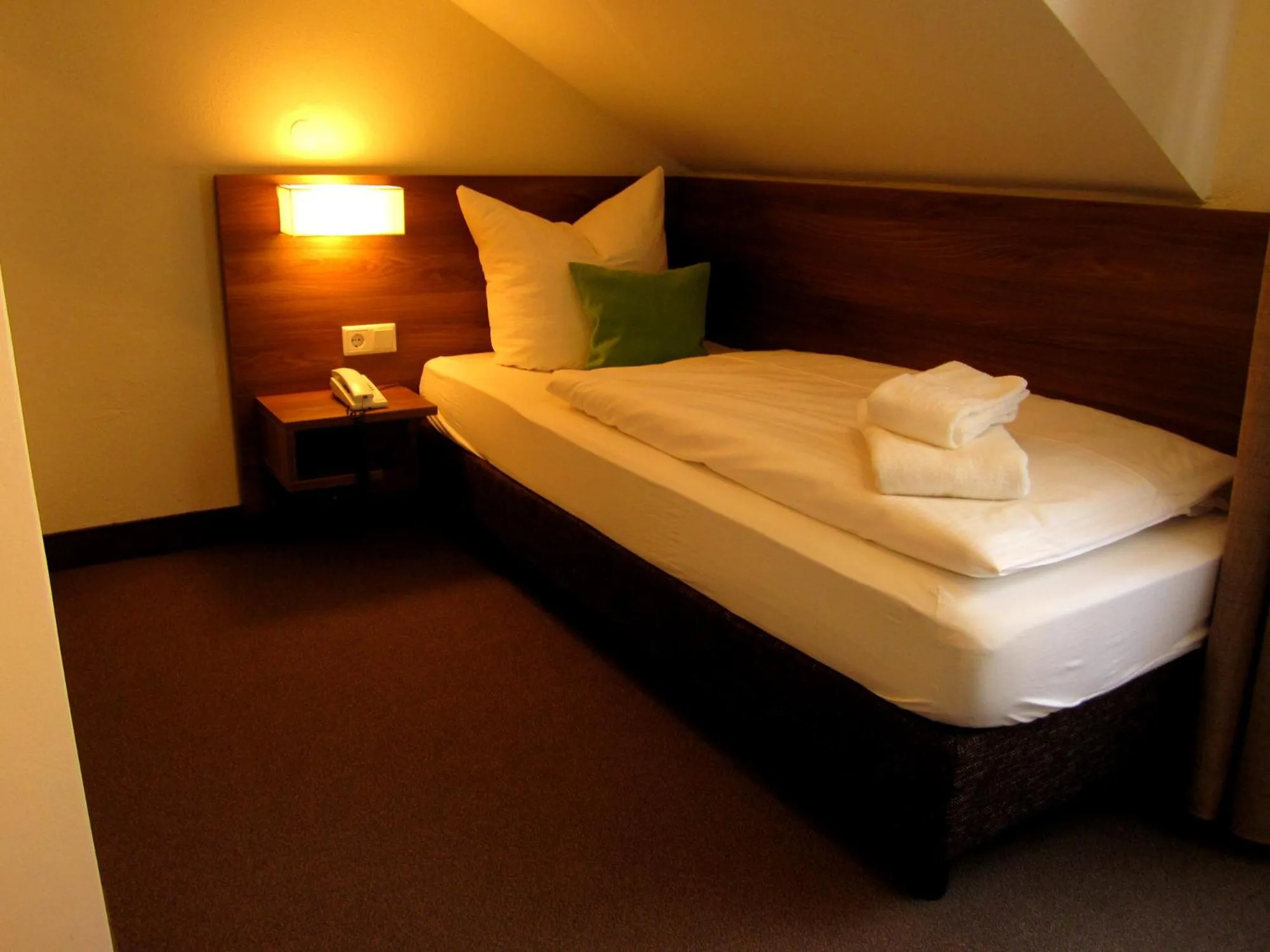 Bed in Hotel Adler