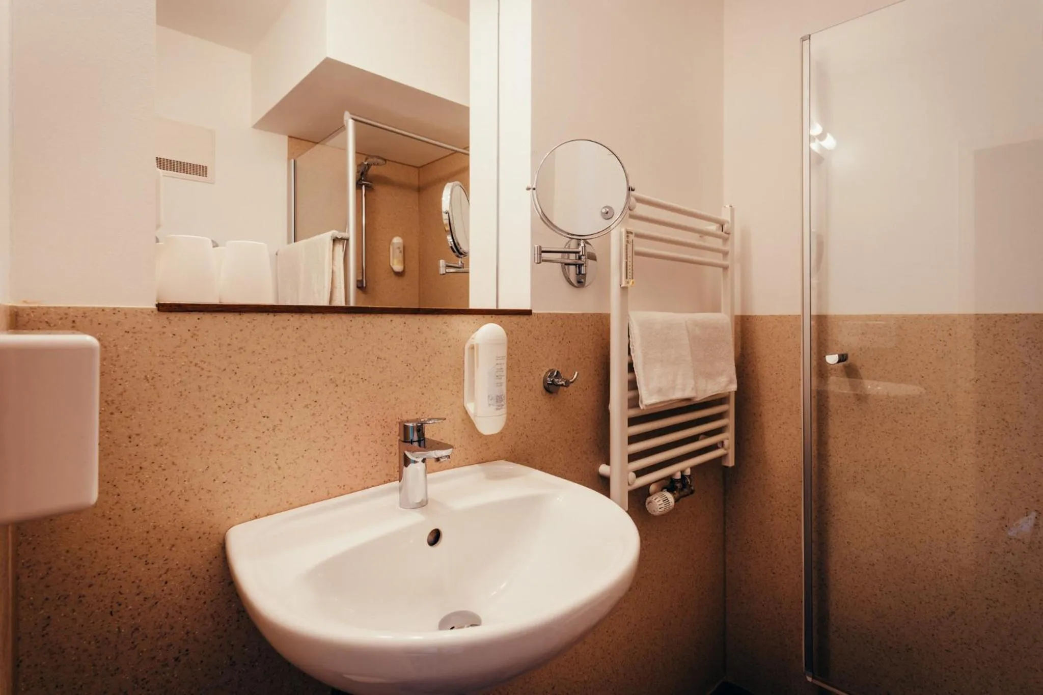 Bathroom in Hotel Adler