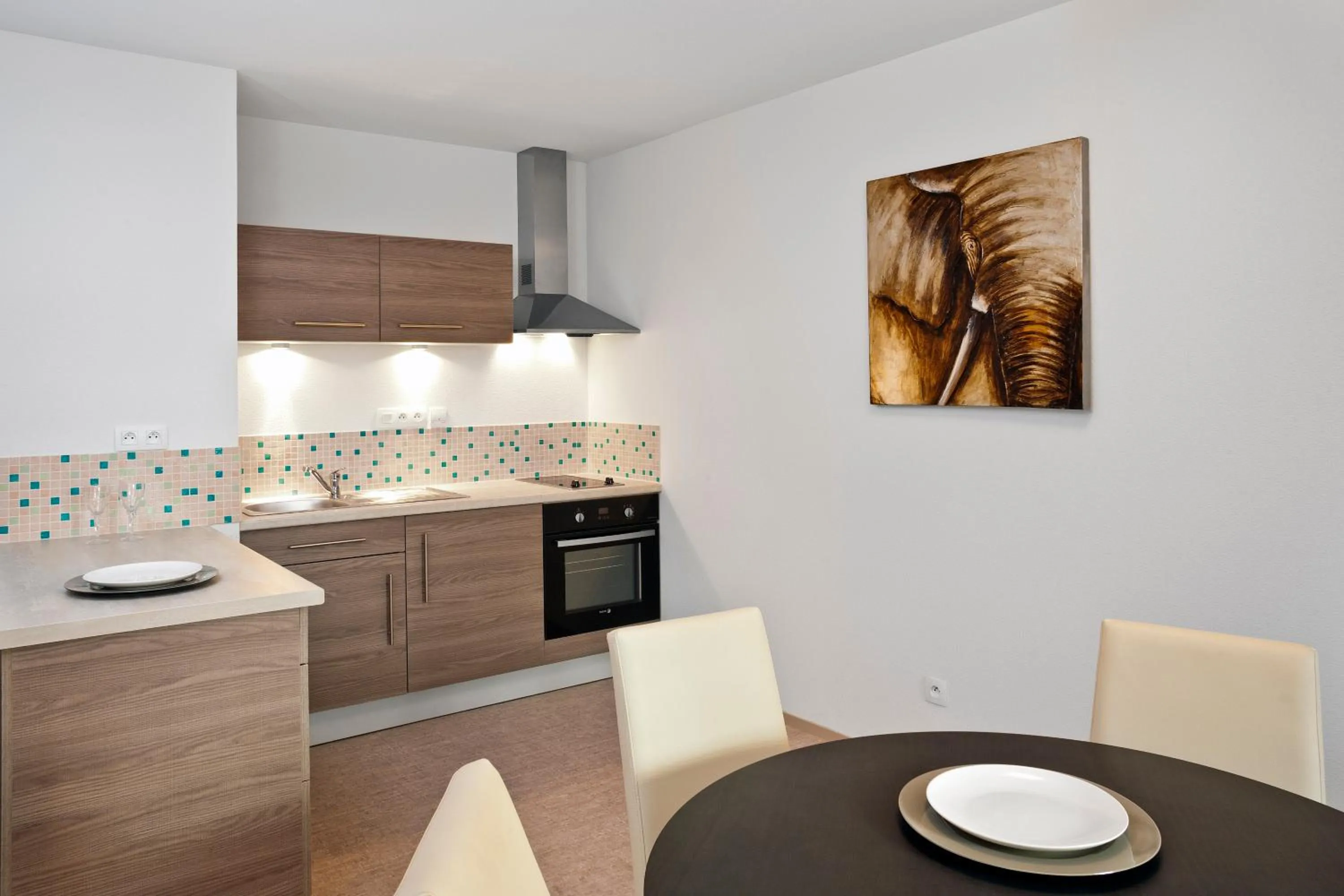 Kitchen or kitchenette in La Résidence Therm’Appart