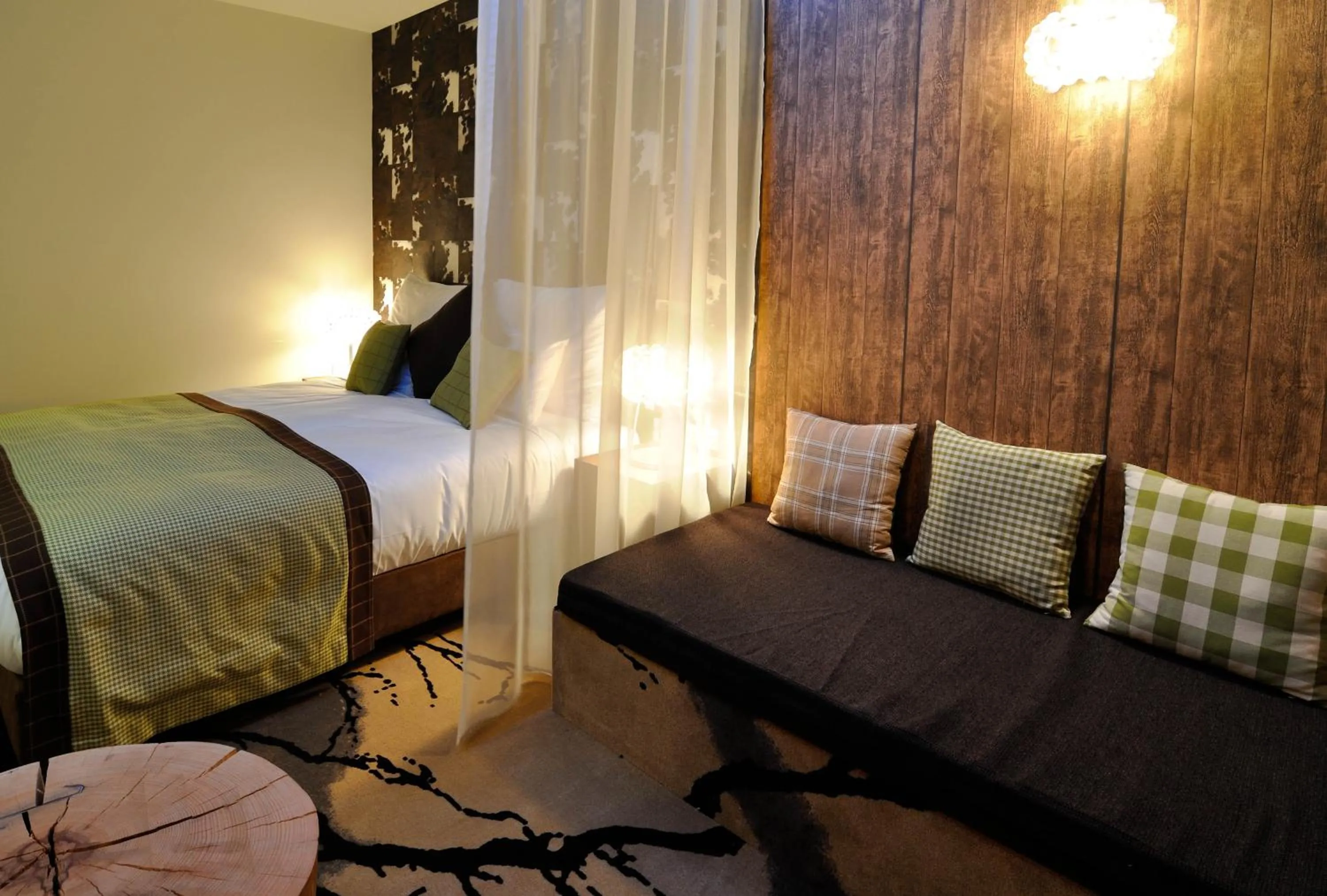 Bed in Hotel Cascade Resort & Spa