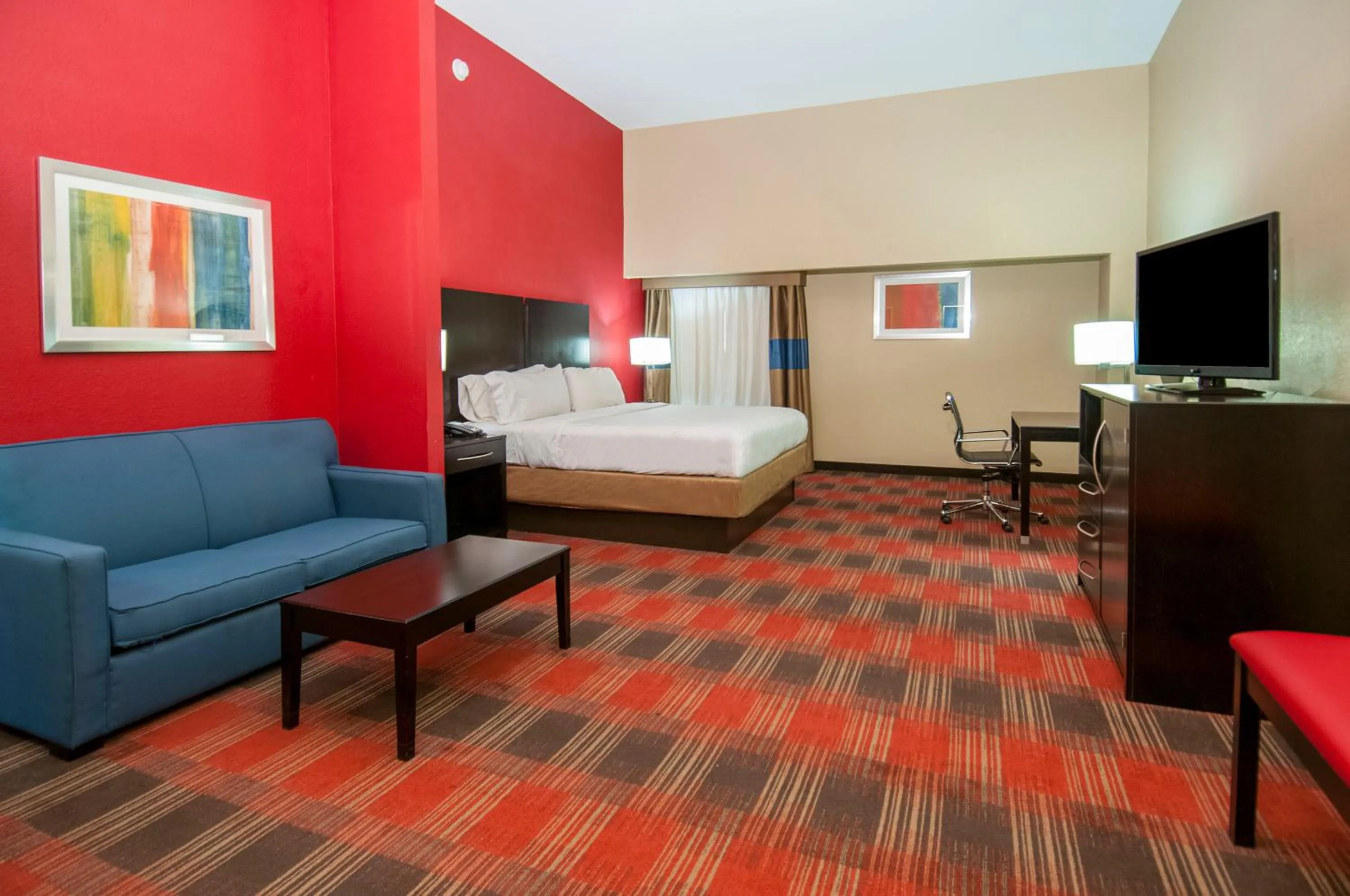 Bedroom, Bed in Holiday Inn Express & Suites Jackson Downtown - Coliseum by IHG