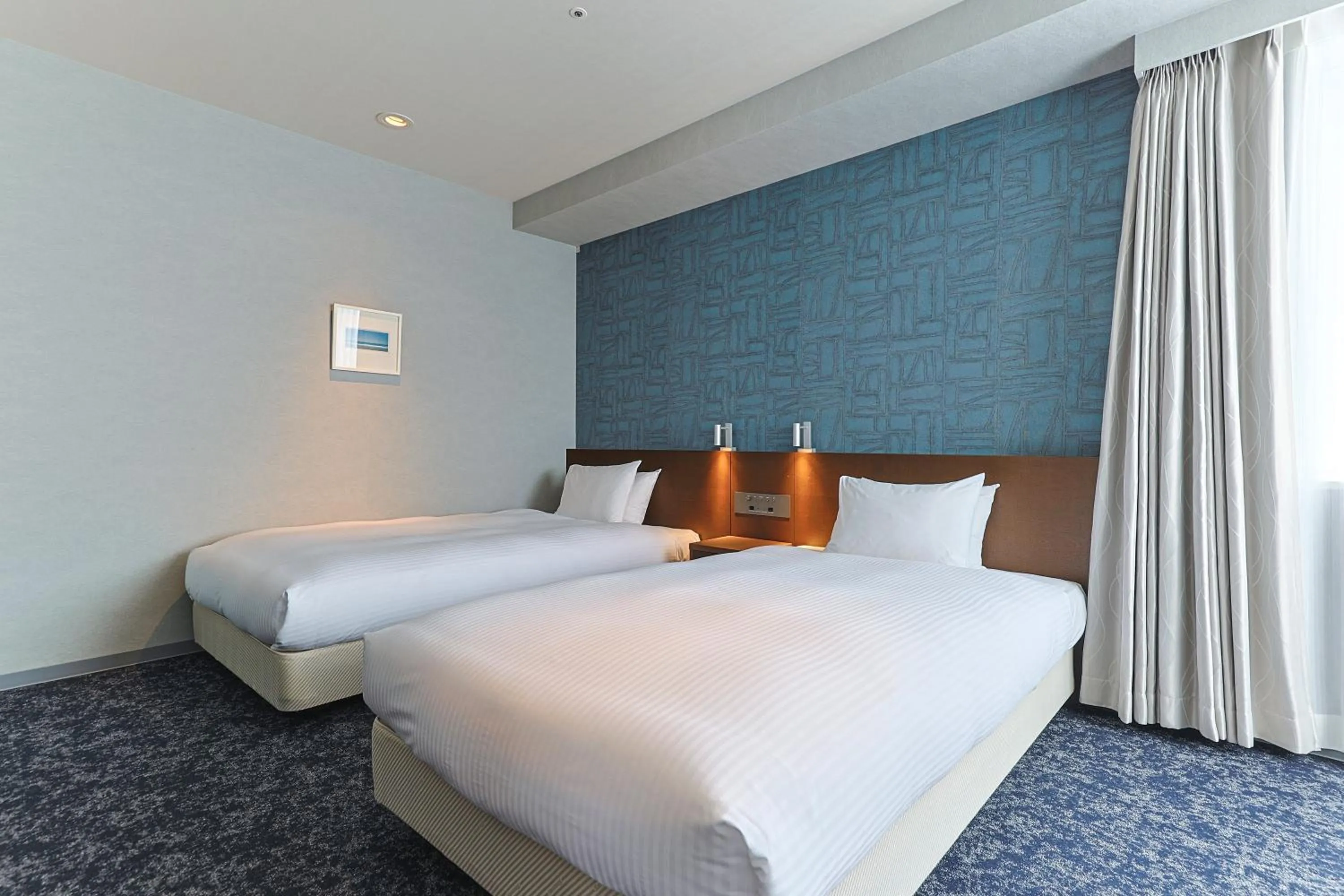 Bed in JR Kyushu Hotel Miyazaki