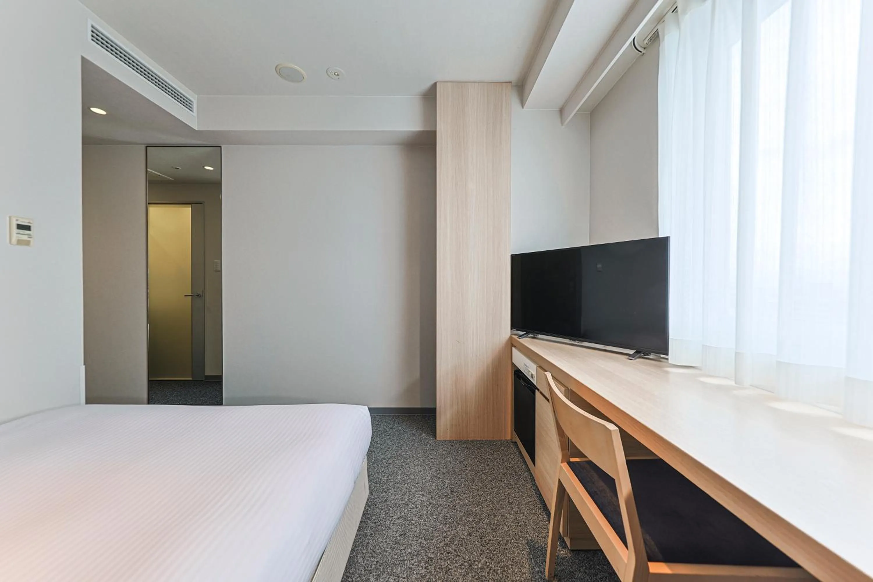 Photo of the whole room, Bed in JR Kyushu Hotel Miyazaki