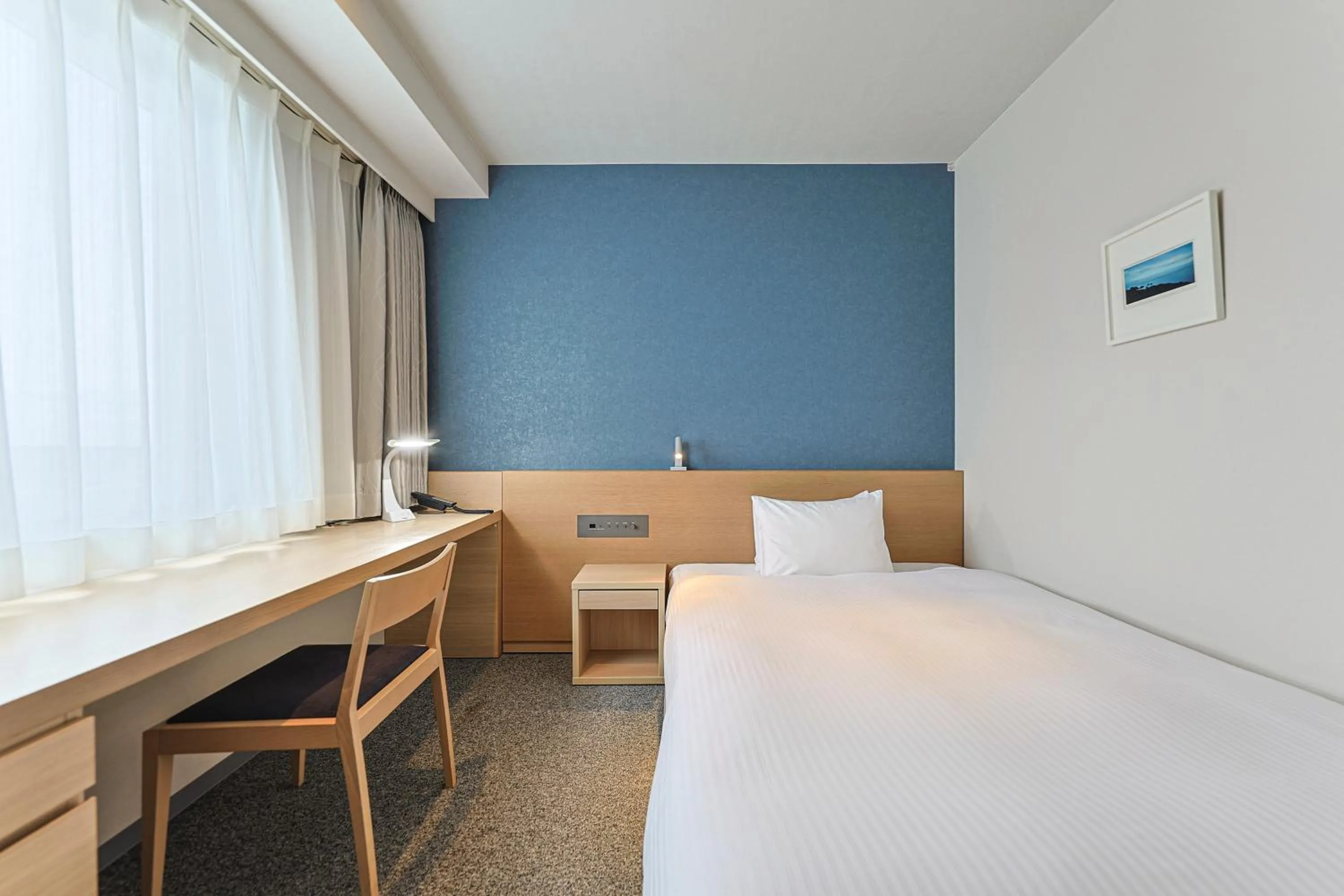 Photo of the whole room, Bed in JR Kyushu Hotel Miyazaki