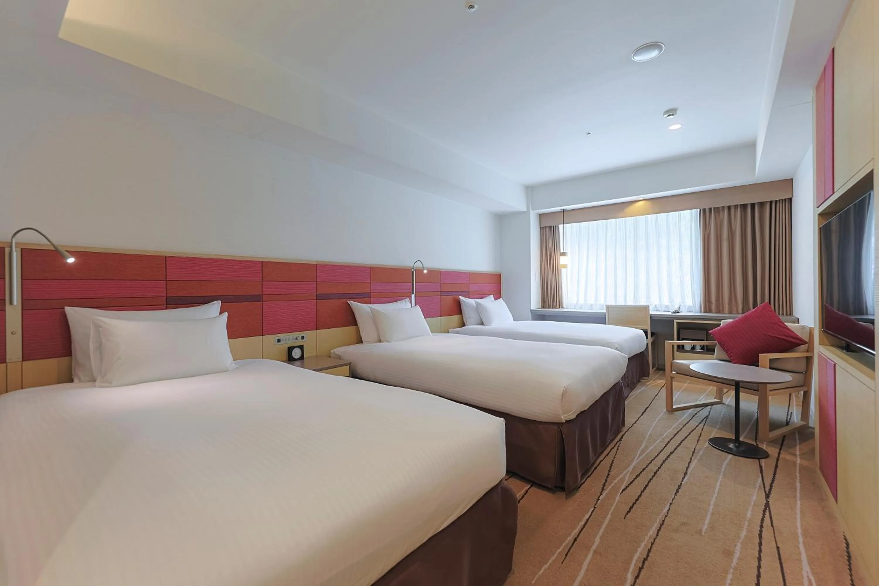 Bed in JR Kyushu Hotel Blossom Hakata Central