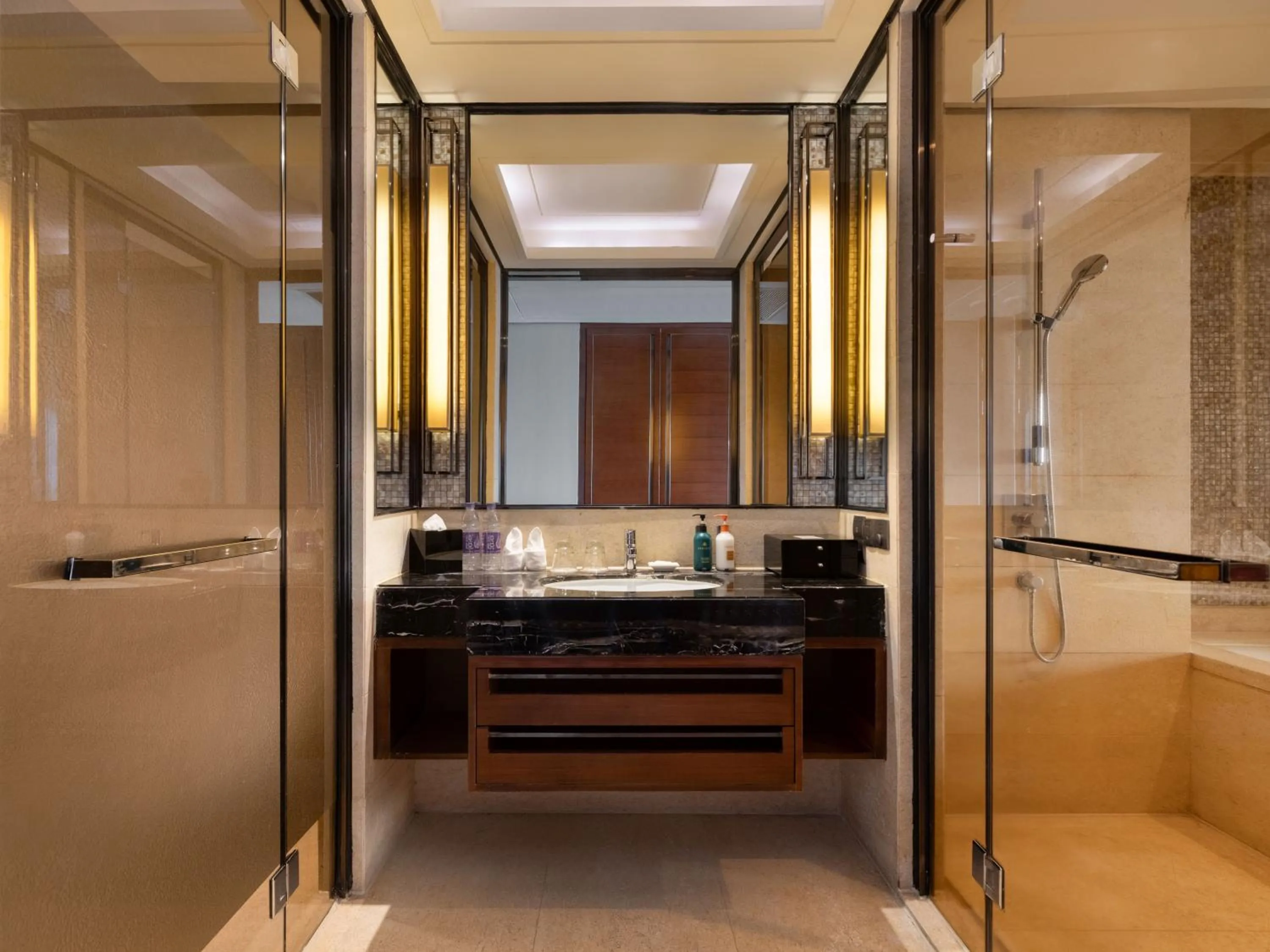 Shower in Crowne Plaza Sanya City Center by IHG