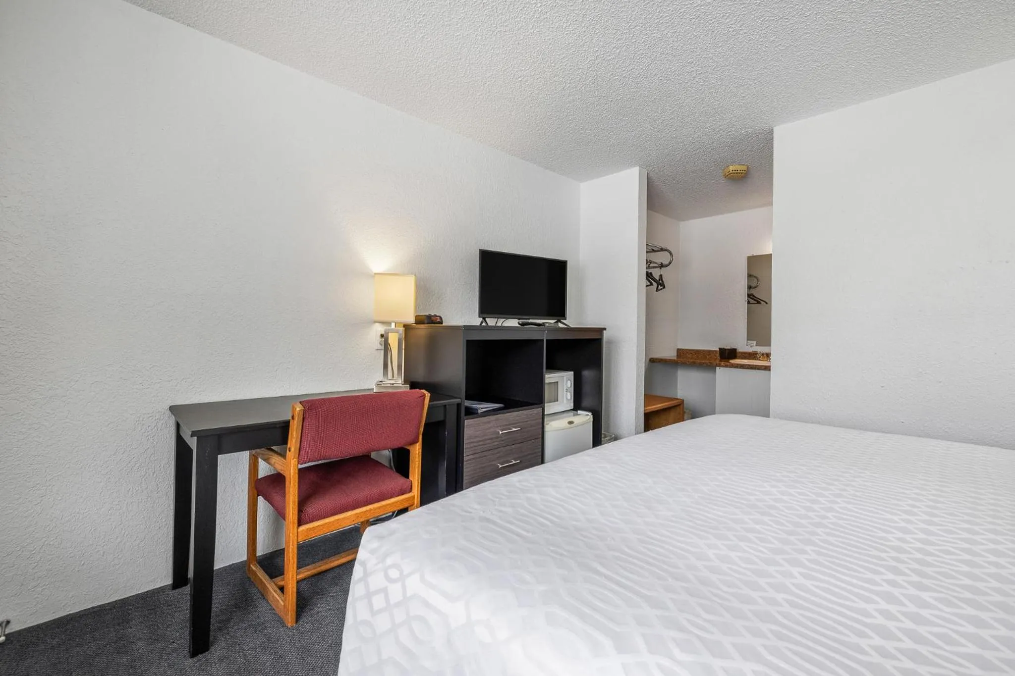 Bed in The Sturgis Motel