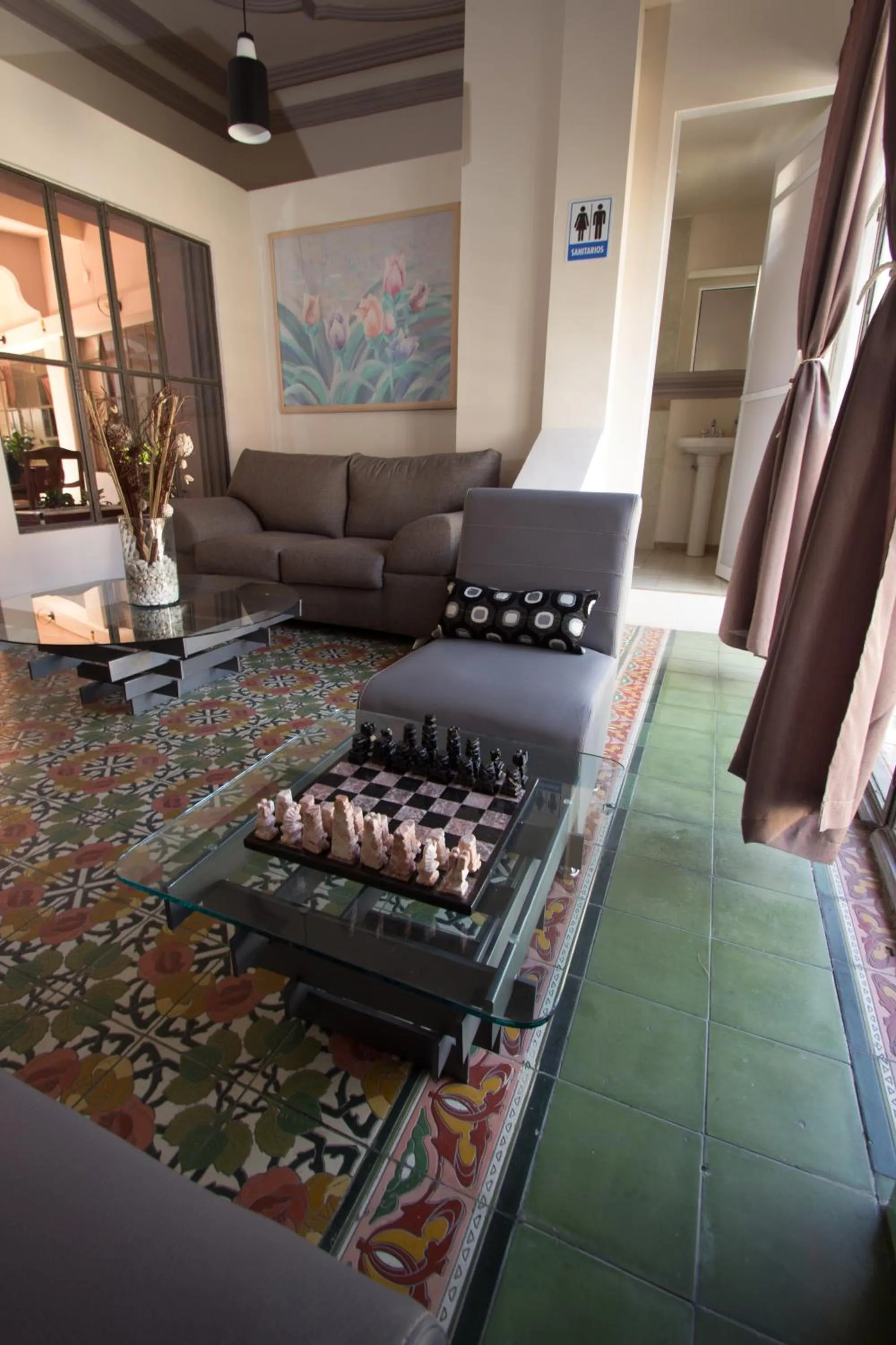 Communal lounge/ TV room in Casa de Juan Hostal