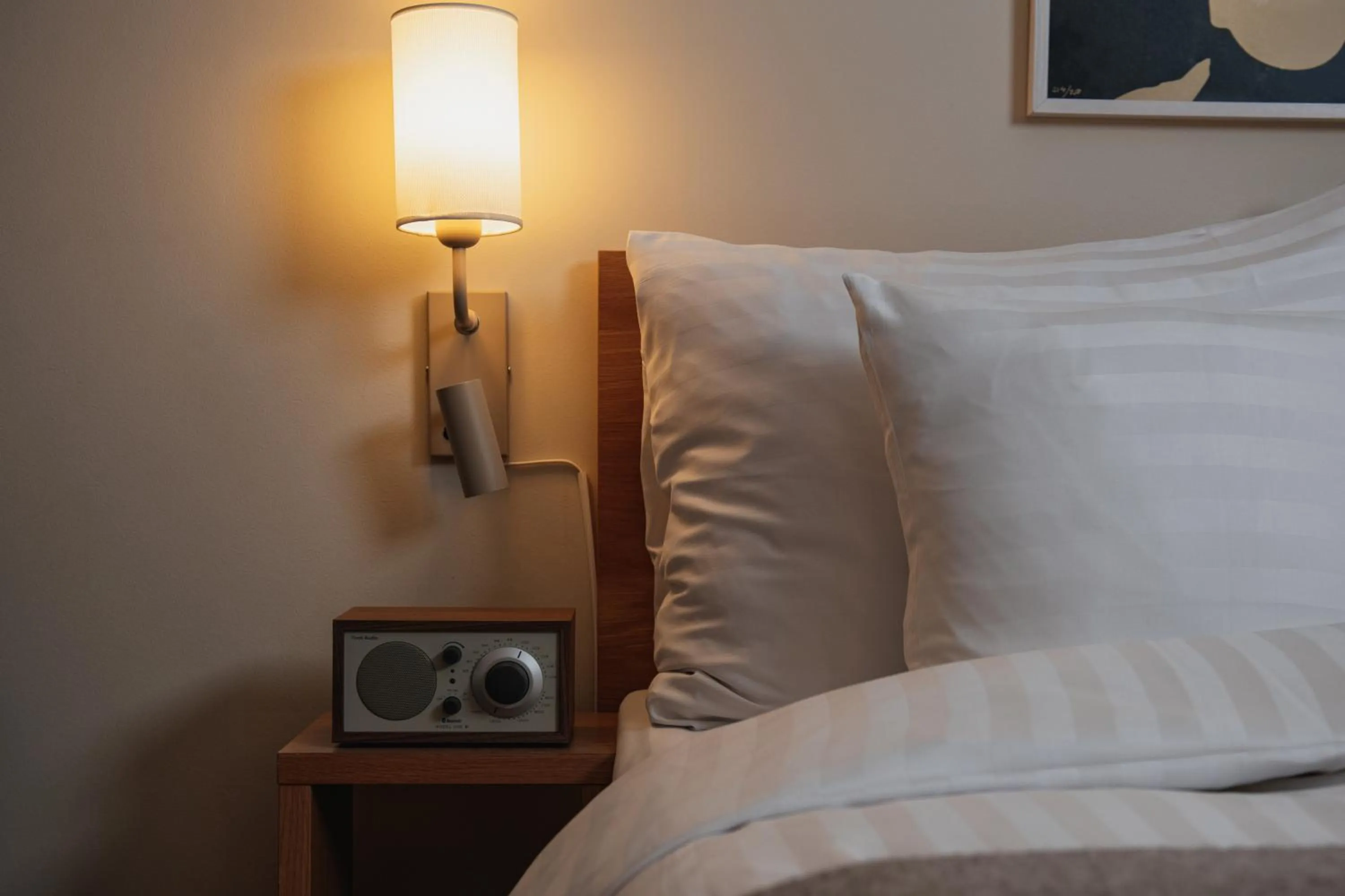 Bed in Home Hotel Mektagonen