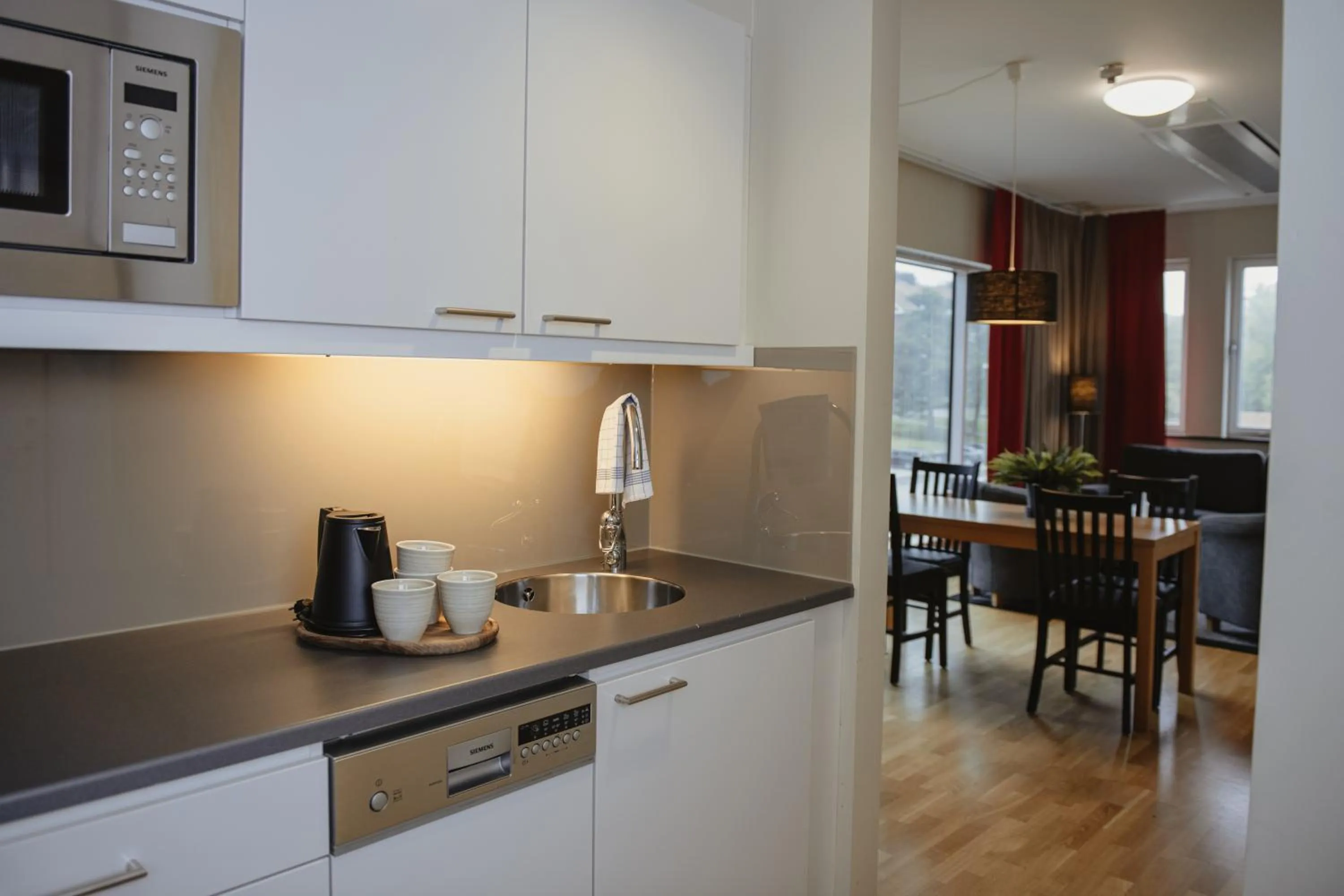 Kitchen or kitchenette in Home Hotel Mektagonen