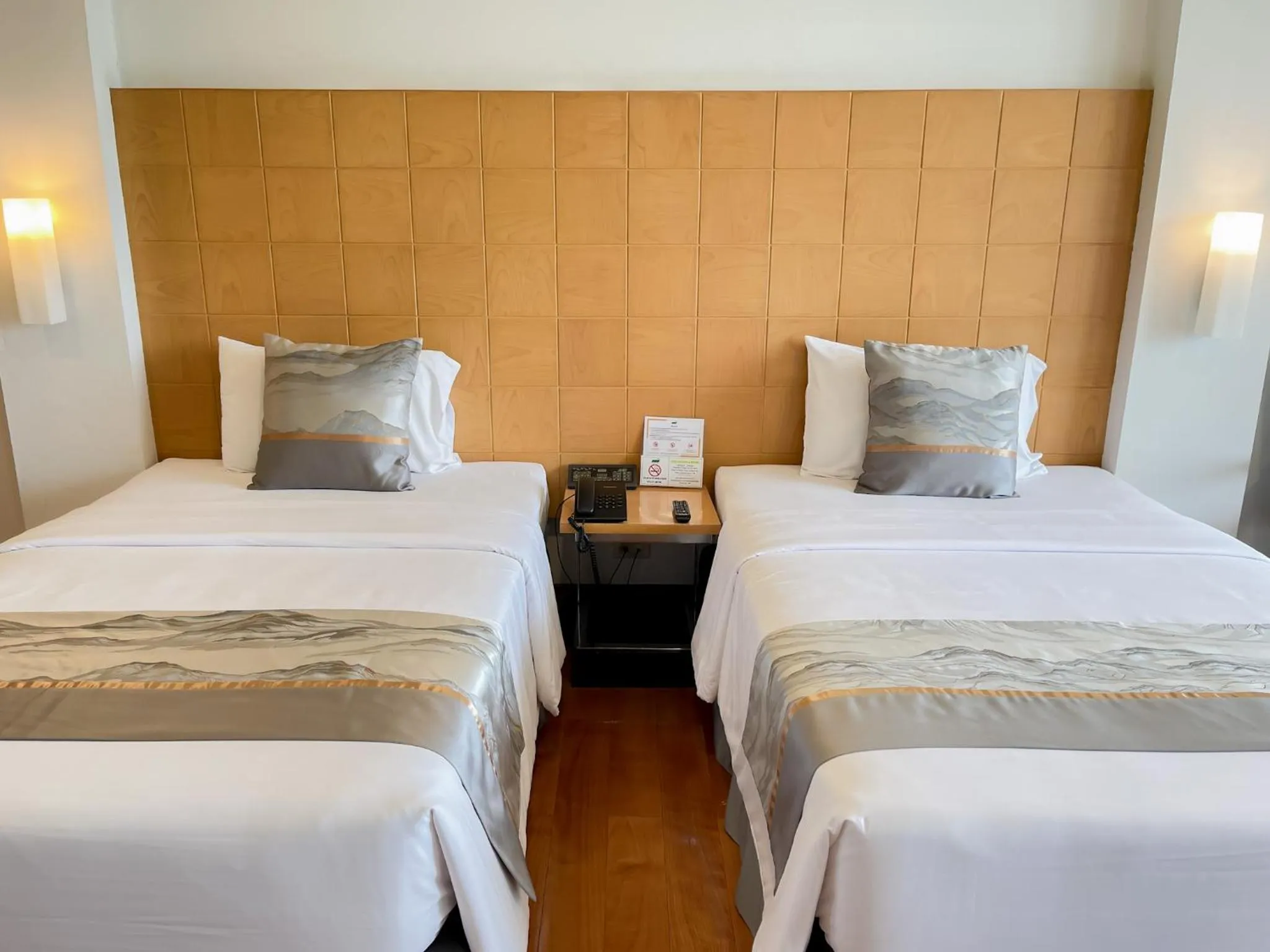 Bed in Uniland Golf & Resort