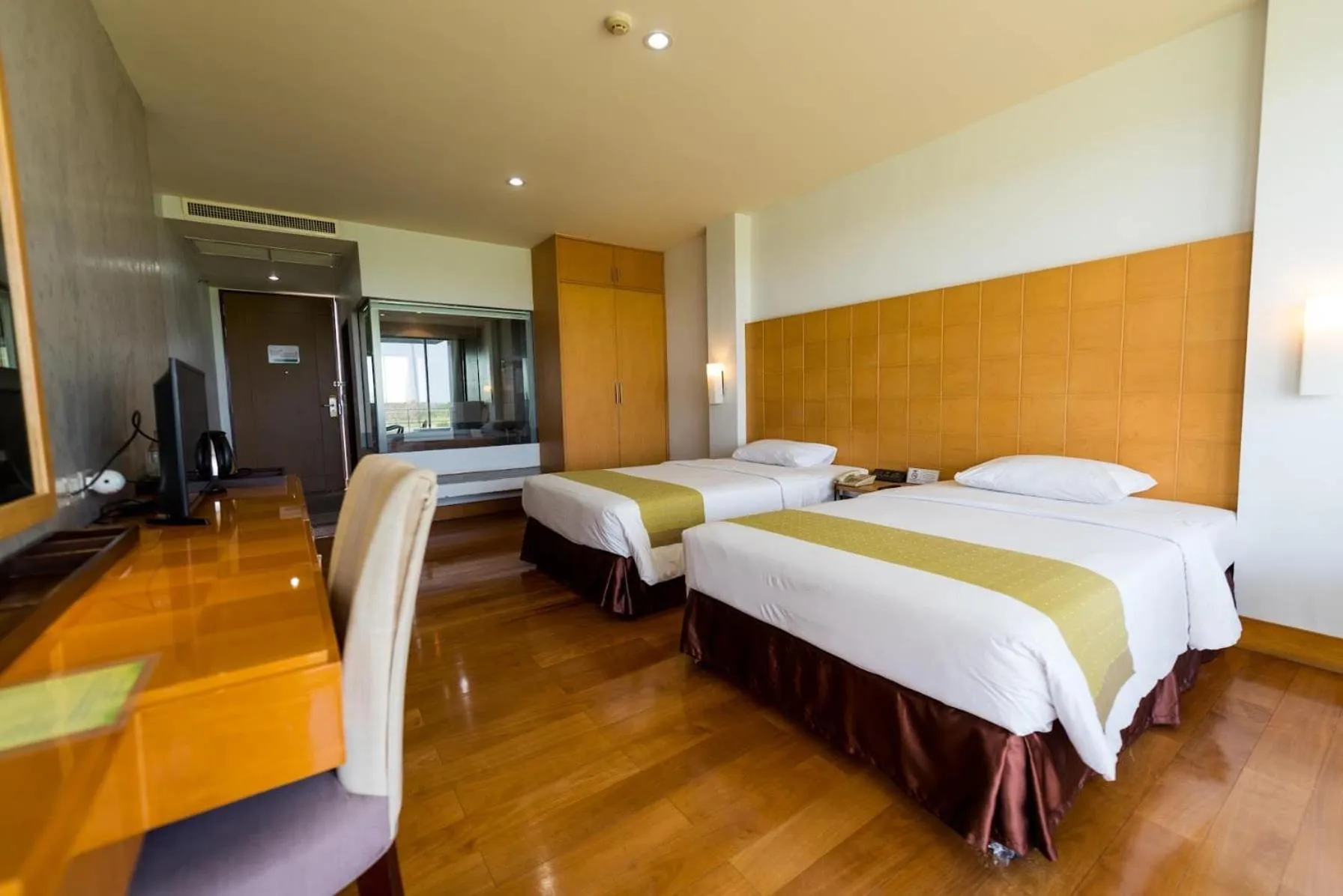 Bed in Uniland Golf & Resort