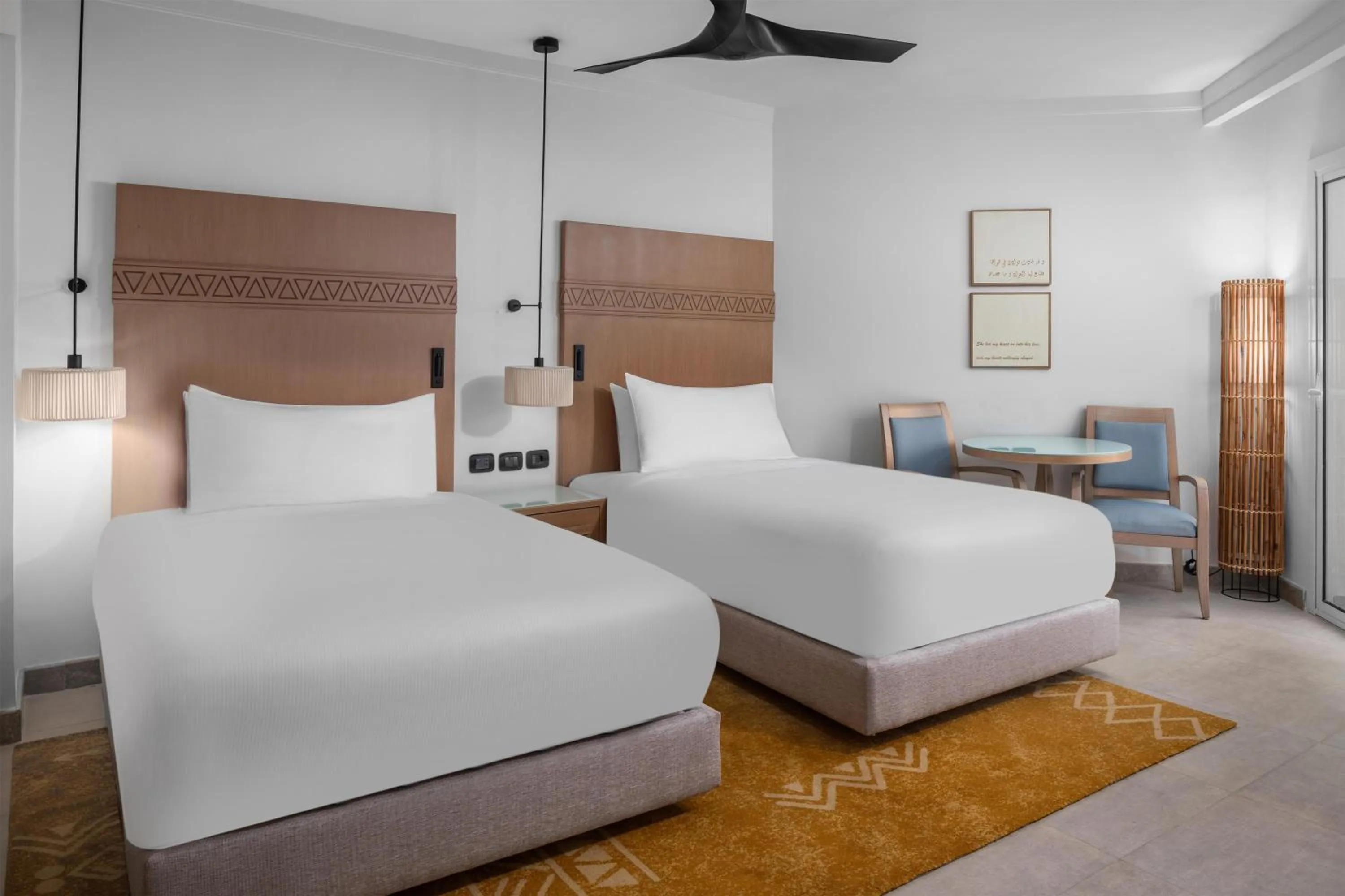 Bed in DoubleTree by Hilton Sharks Bay Resort