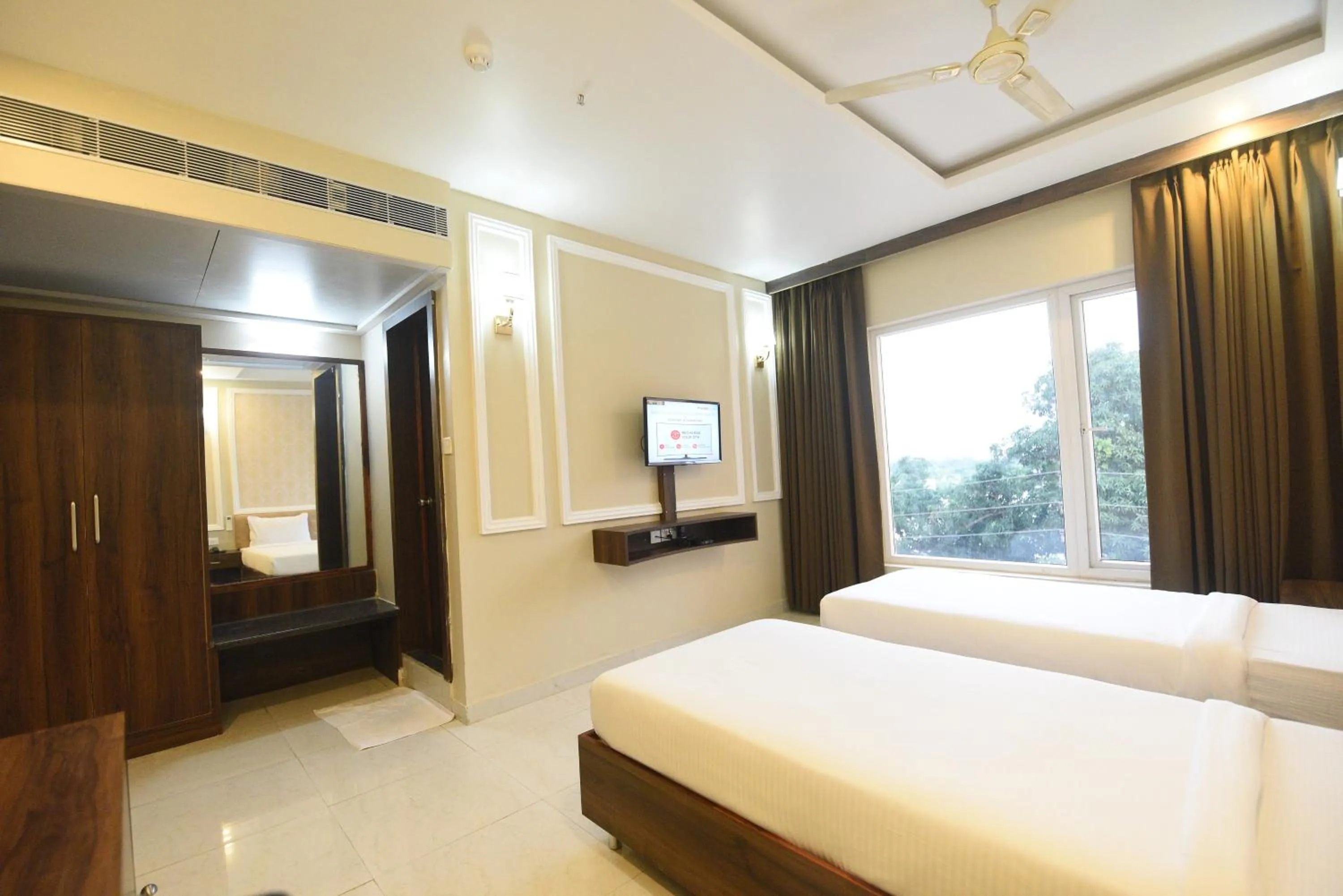 Photo of the whole room, Bed in Hotel Nilay Residency